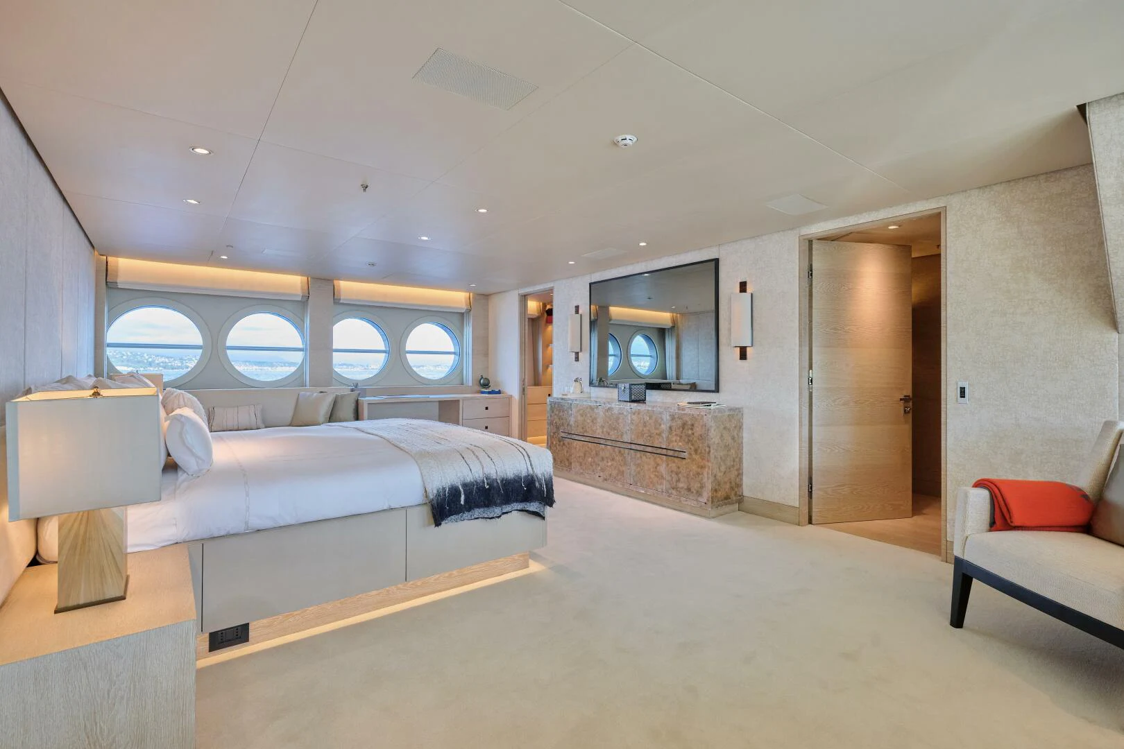 a room with a bed and a couch aboard SANAM Yacht for Sale