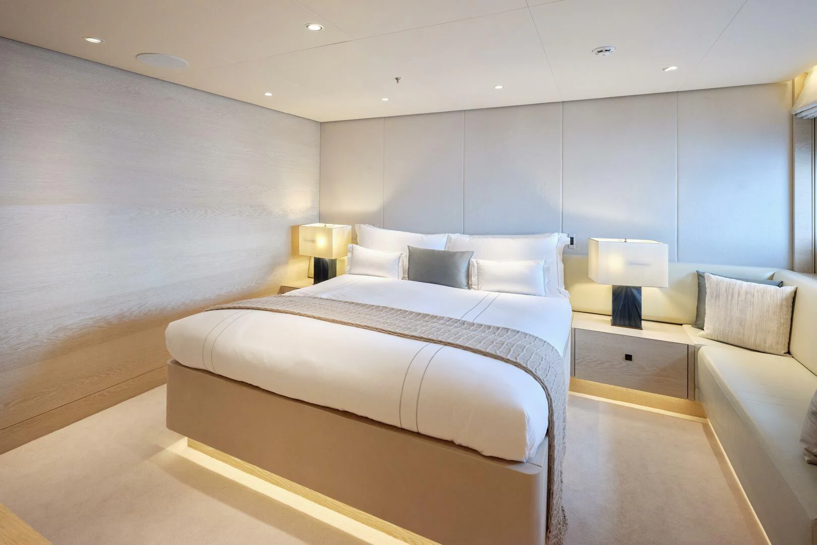 a room with a bed and a desk aboard SANAM Yacht for Sale