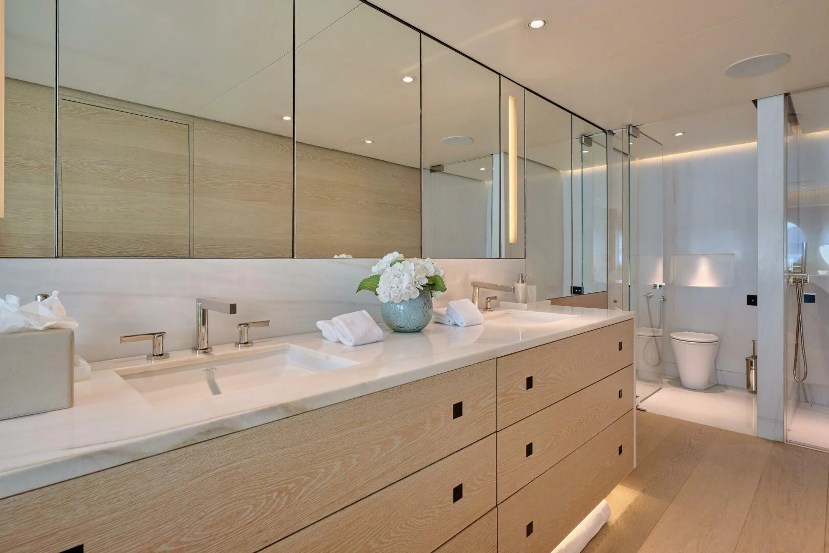 a bathroom with a large mirror aboard SANAM Yacht for Sale