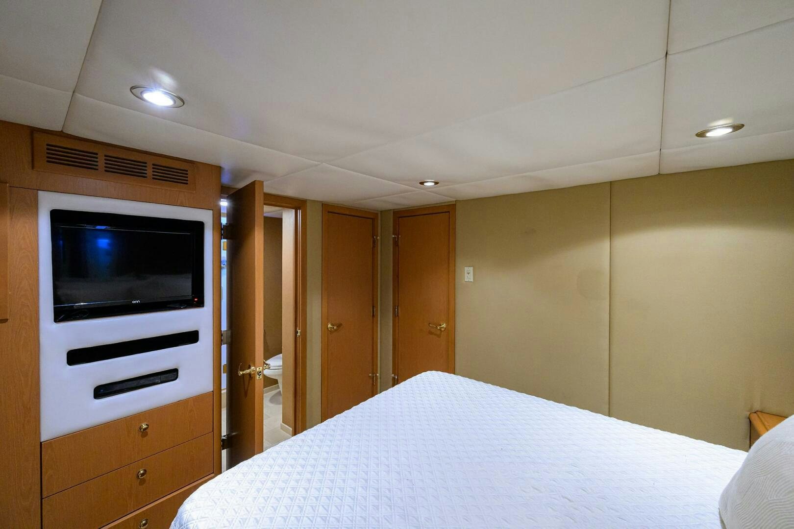 a television on a wall in a room aboard BUSINESS TRIP 2 Yacht for Sale