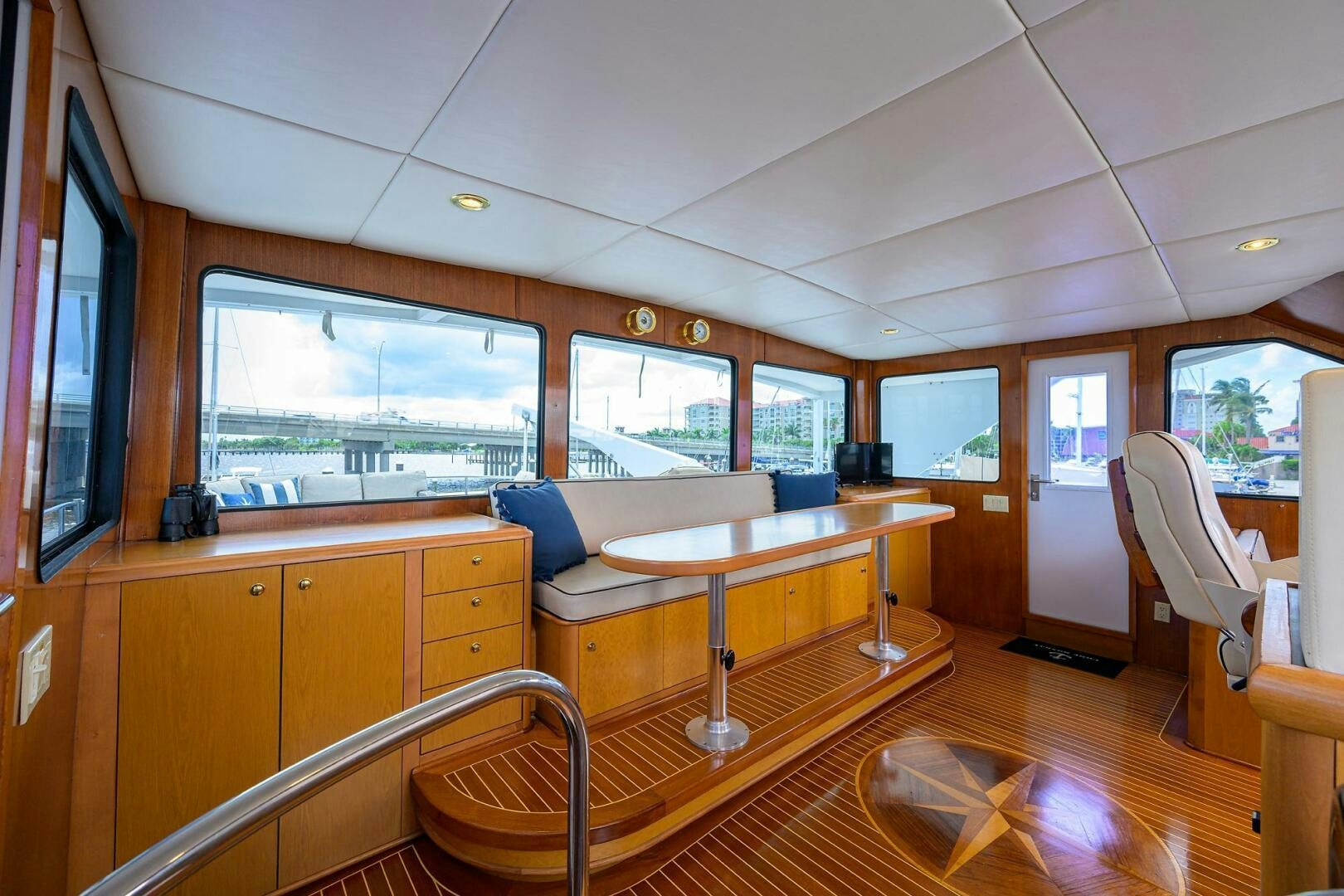 a room with a table and chairs aboard BUSINESS TRIP 2 Yacht for Sale