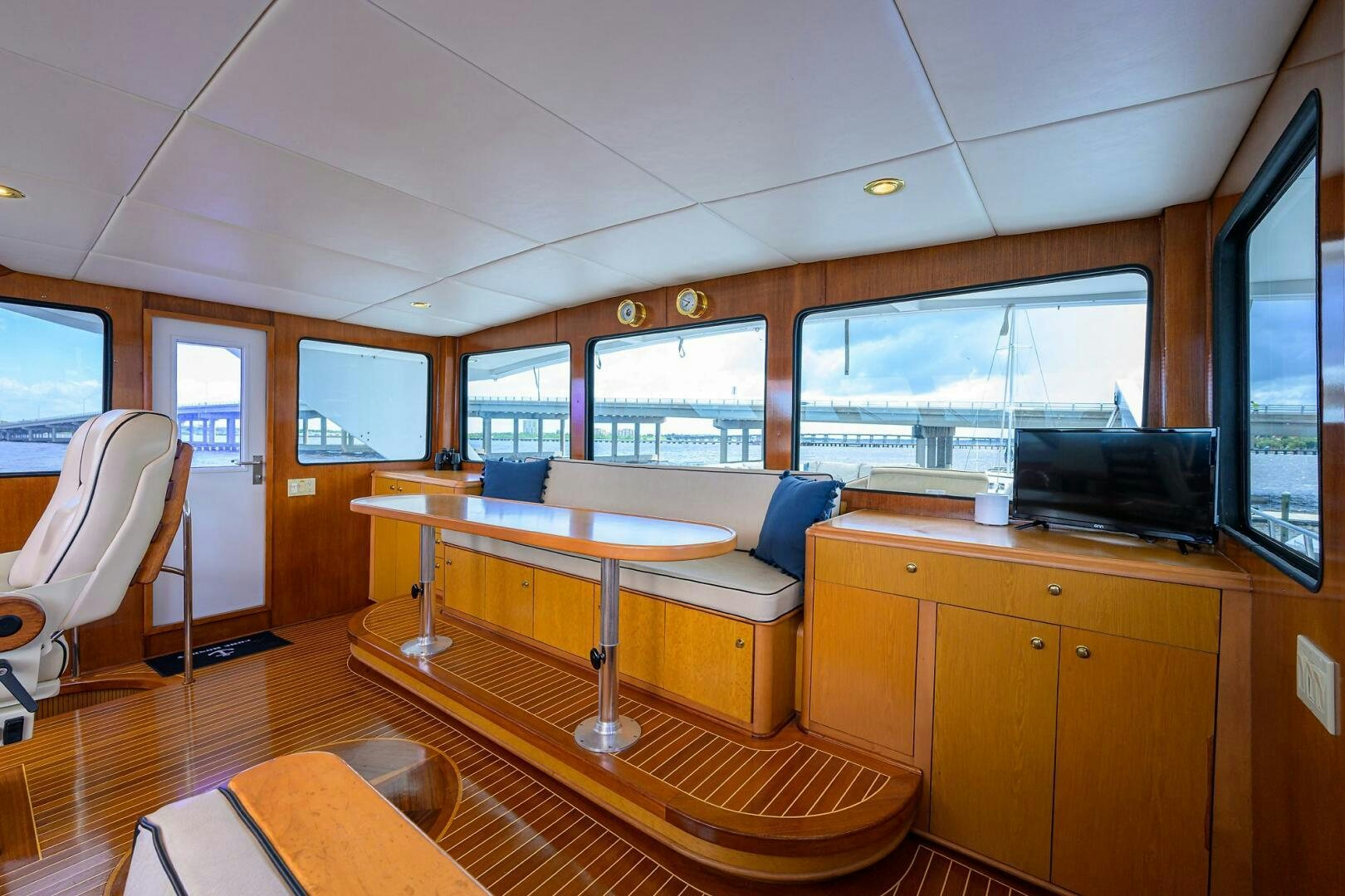 a room with a couch and a table aboard BUSINESS TRIP 2 Yacht for Sale