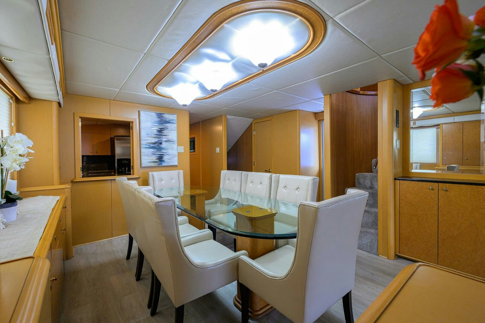 a dining room with a table and chairs aboard BUSINESS TRIP 2 Yacht for Sale