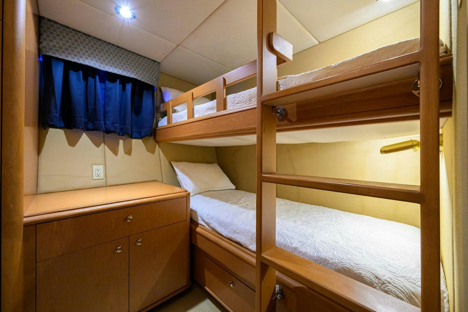 bunk beds in a room aboard BUSINESS TRIP 2 Yacht for Sale