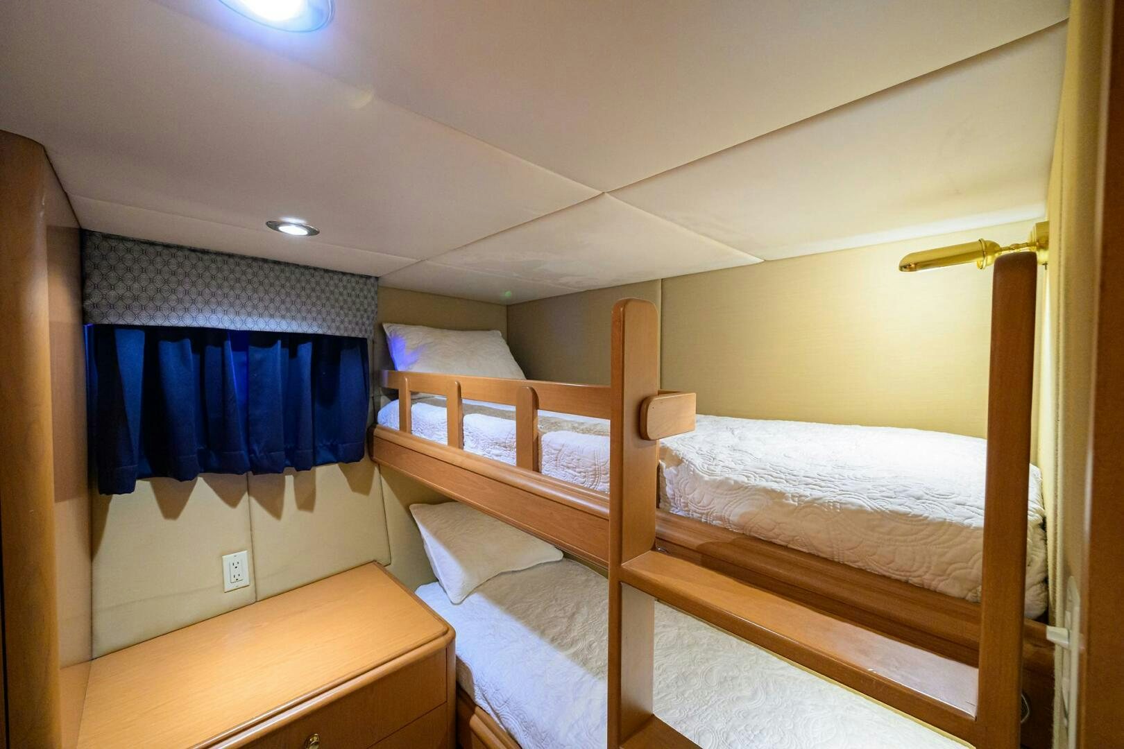 a room with bunk beds aboard BUSINESS TRIP 2 Yacht for Sale