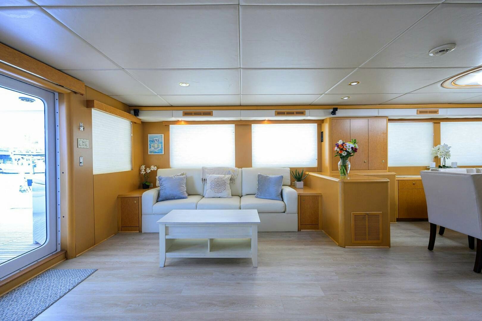 a room with a couch and a table aboard BUSINESS TRIP 2 Yacht for Sale