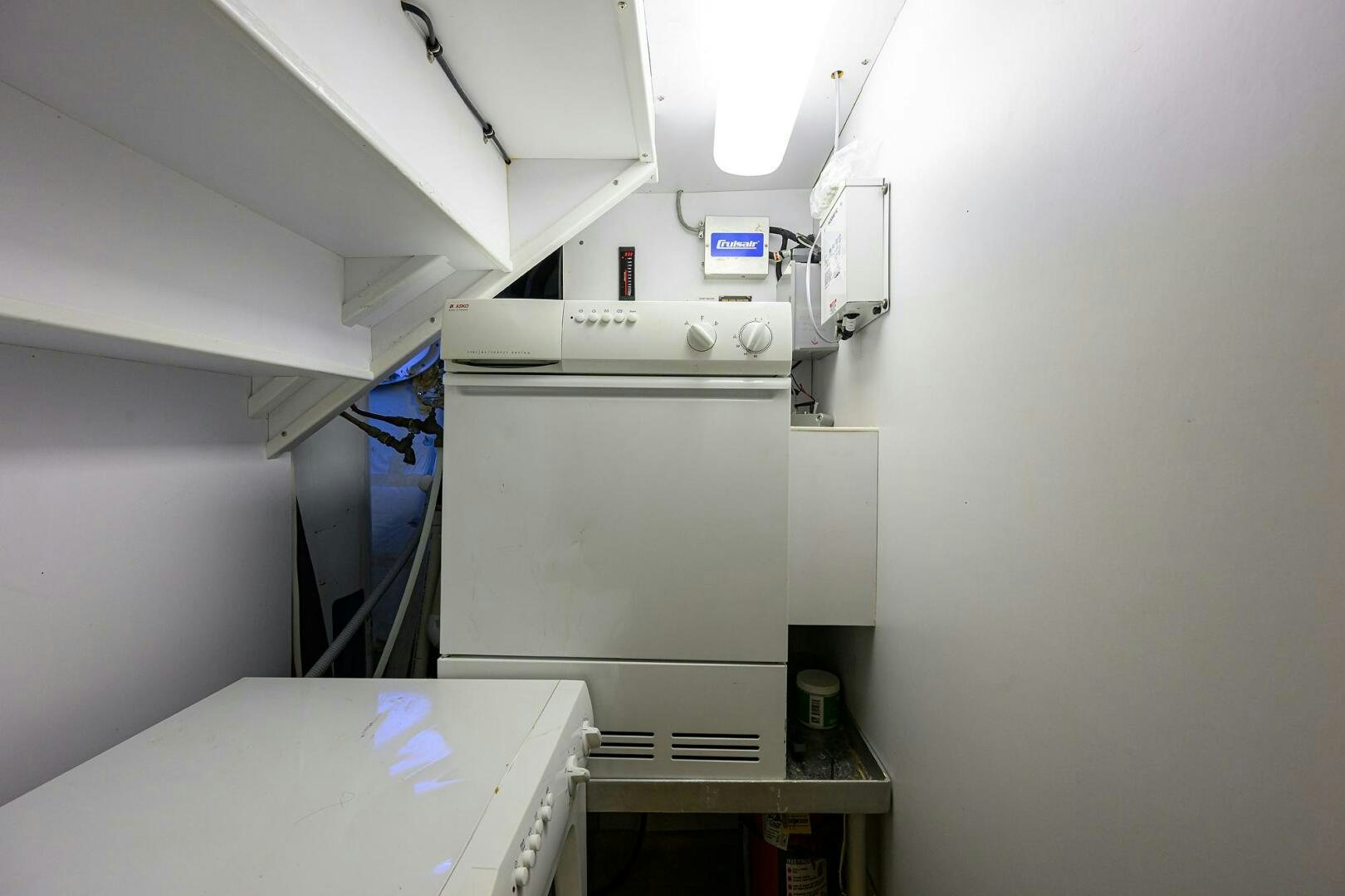 a kitchen with a large white stove aboard BUSINESS TRIP 2 Yacht for Sale