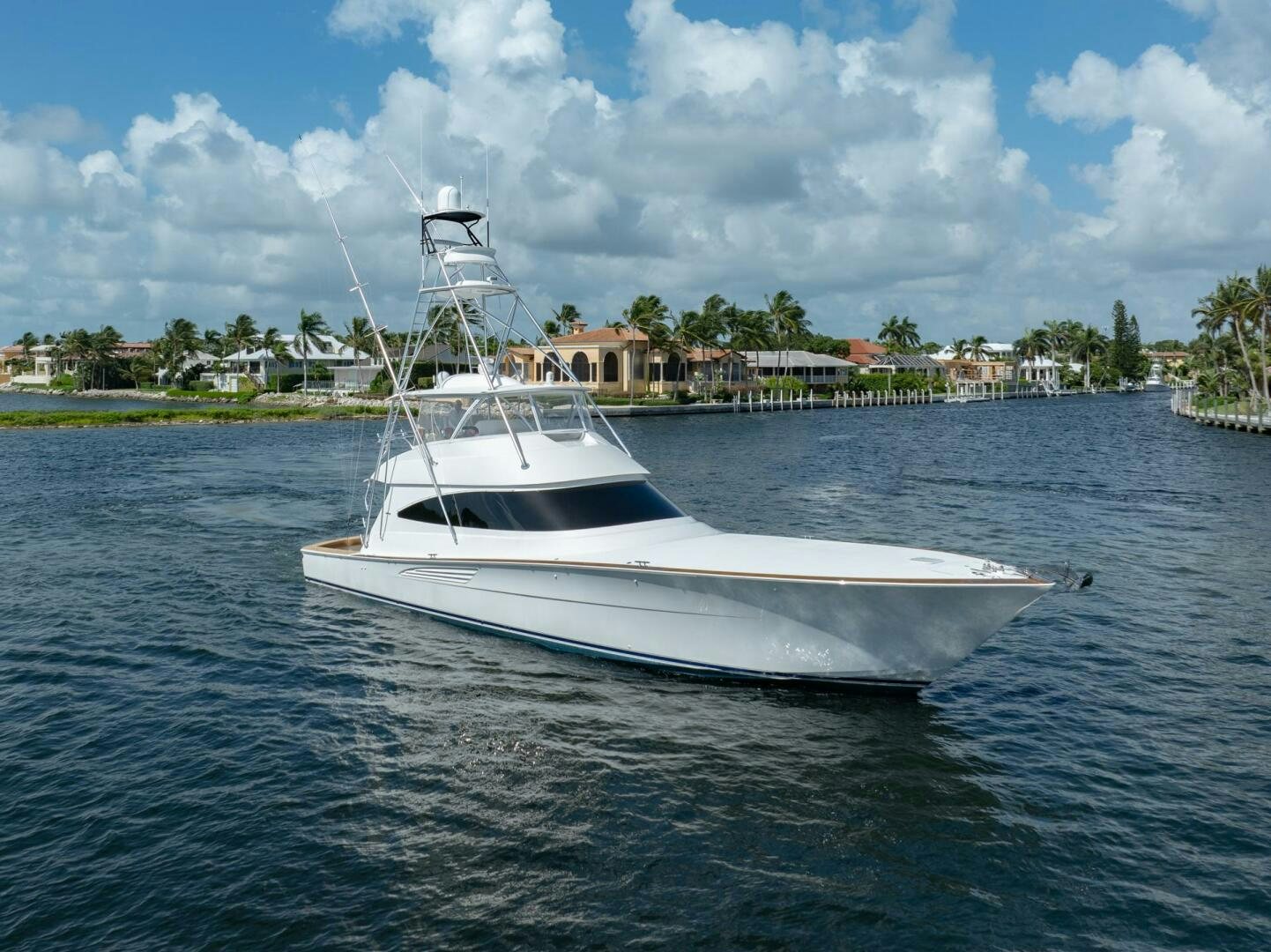 a white boat in the water aboard REEL CENTS Yacht for Sale