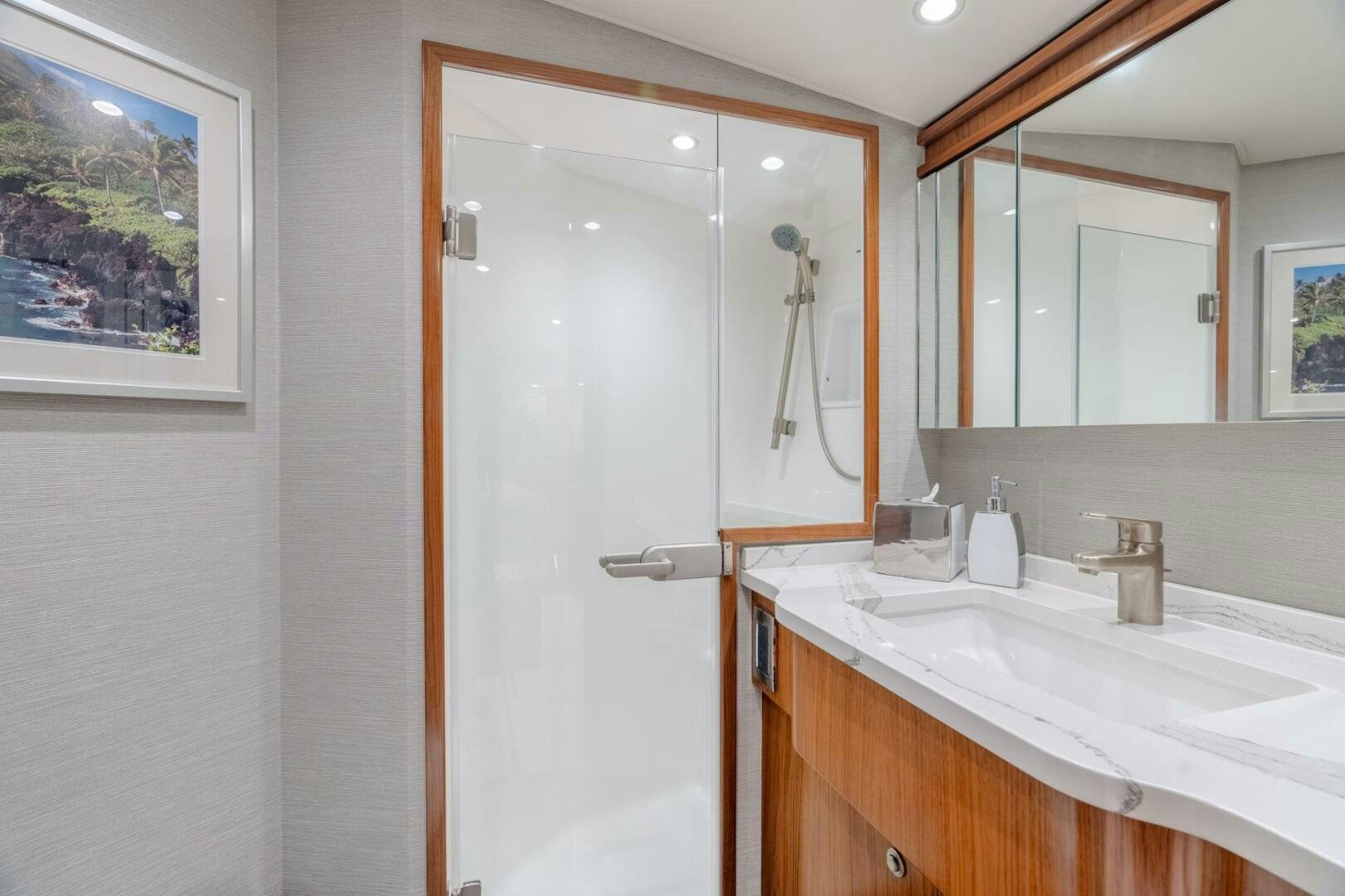 a bathroom with a sink and a mirror aboard REEL CENTS Yacht for Sale