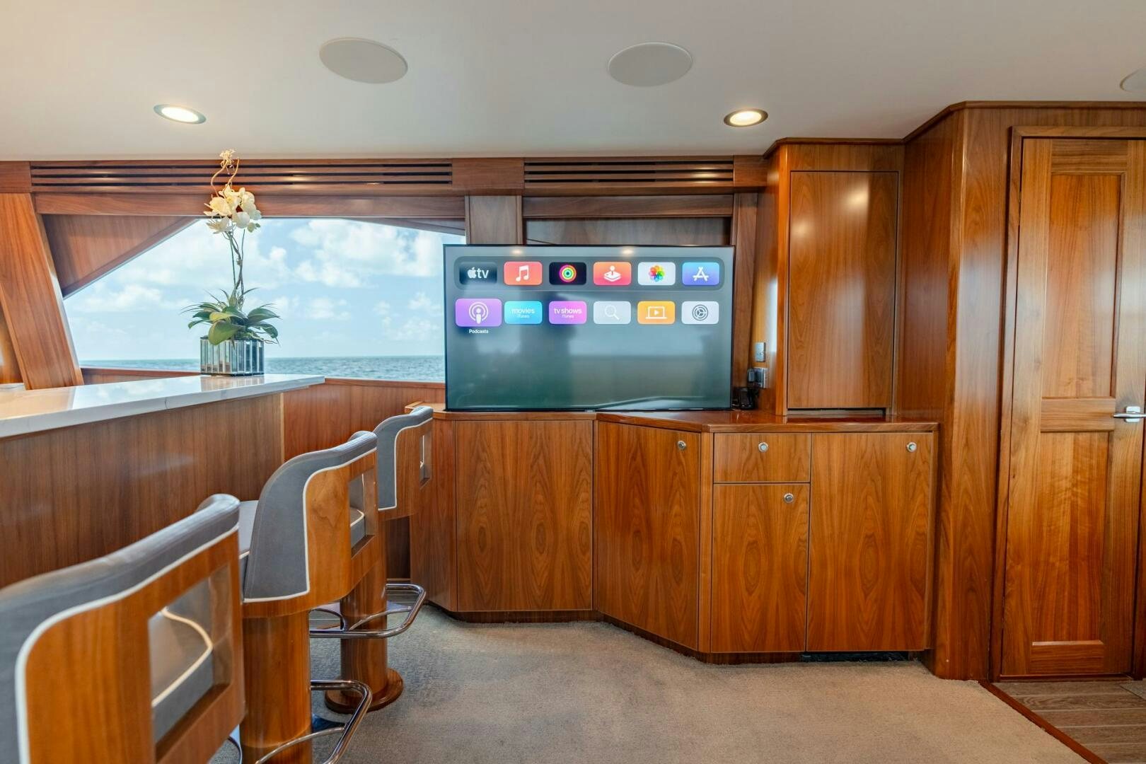 a room with a large tv aboard REEL CENTS Yacht for Sale