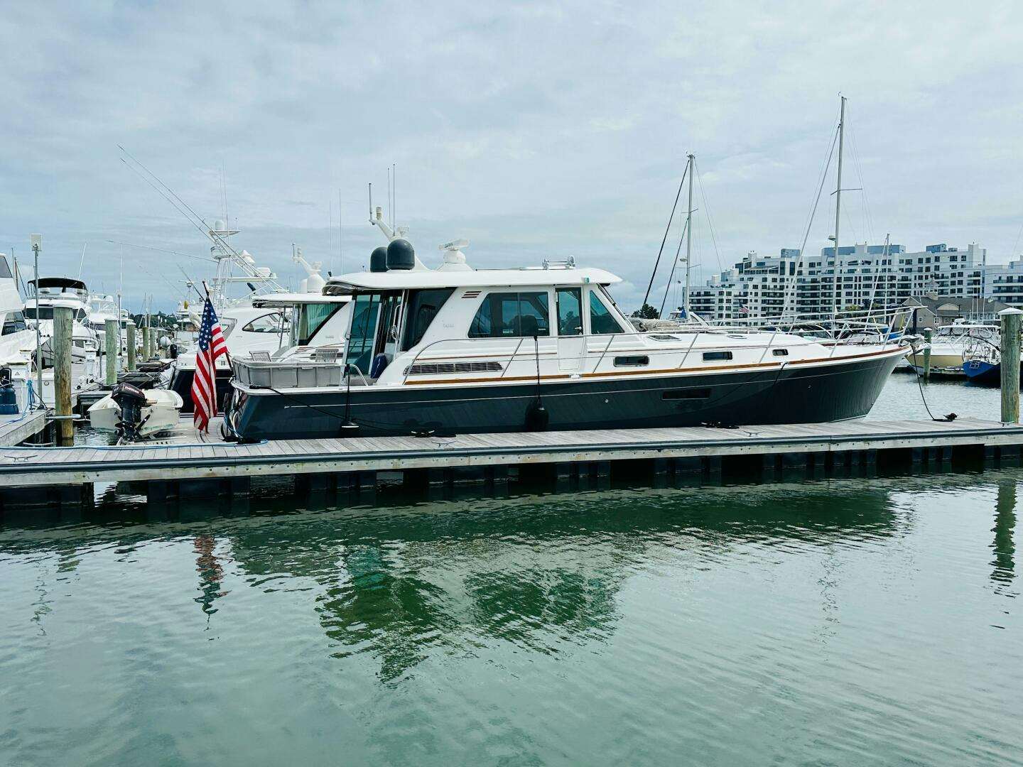 a boat docked at a pier aboard SEA C IV Yacht for Sale