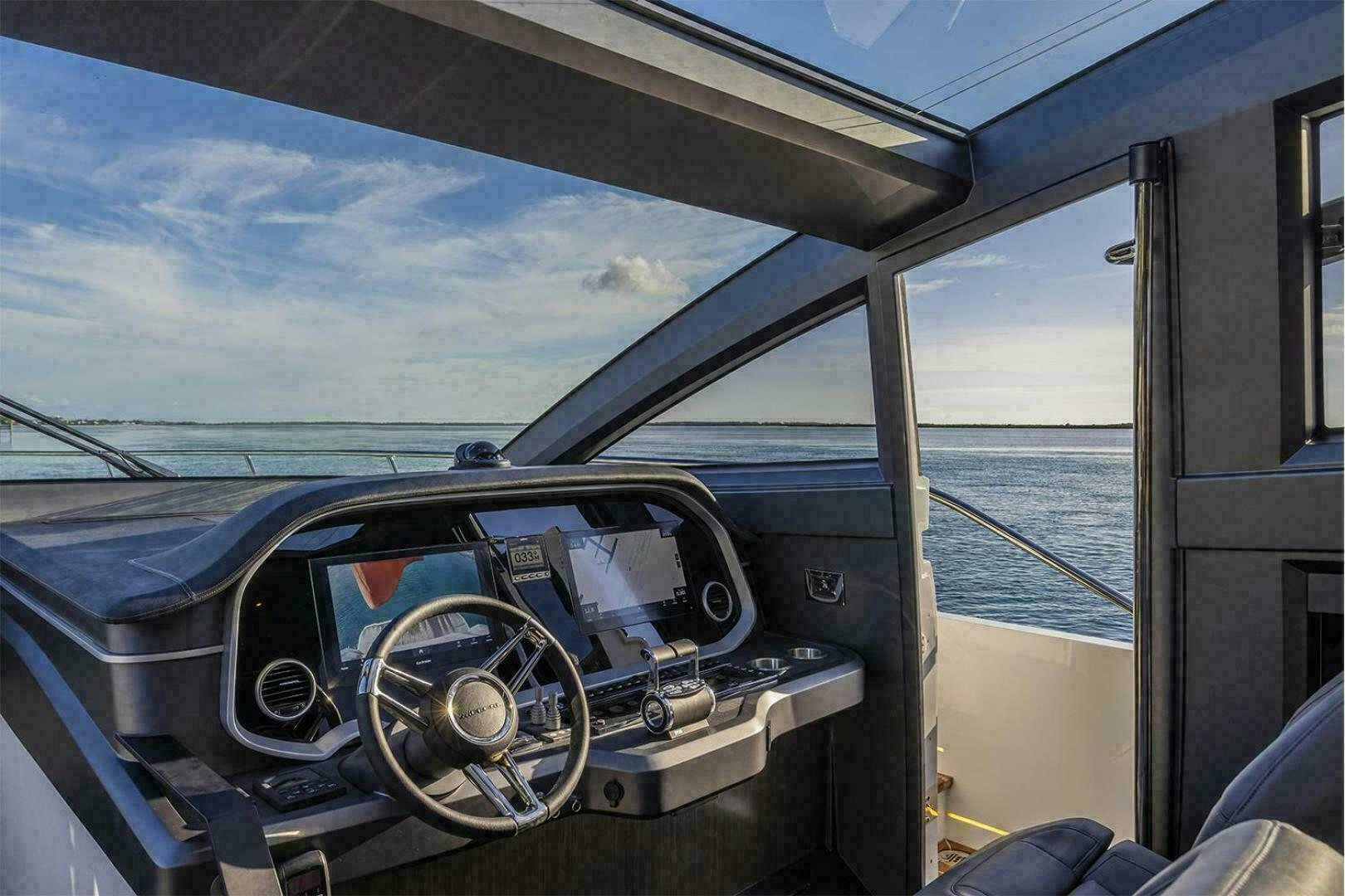 the inside of a car aboard NONE Yacht for Sale