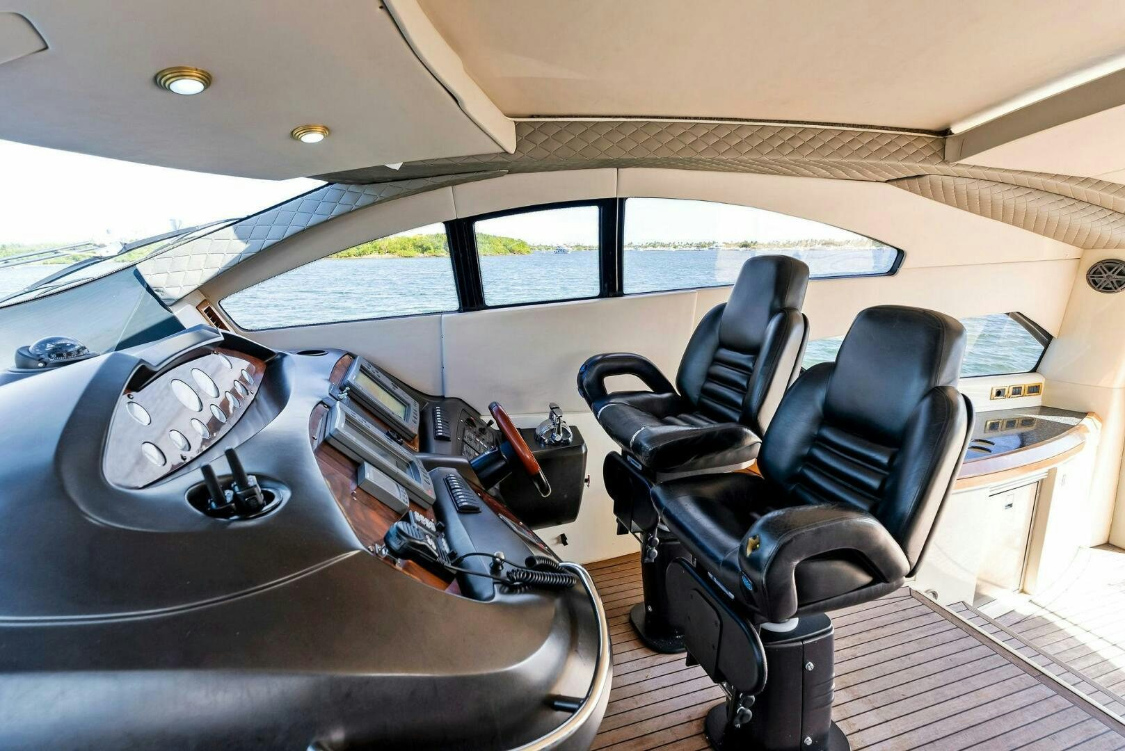 inside of a car aboard GAMBLER Yacht for Sale