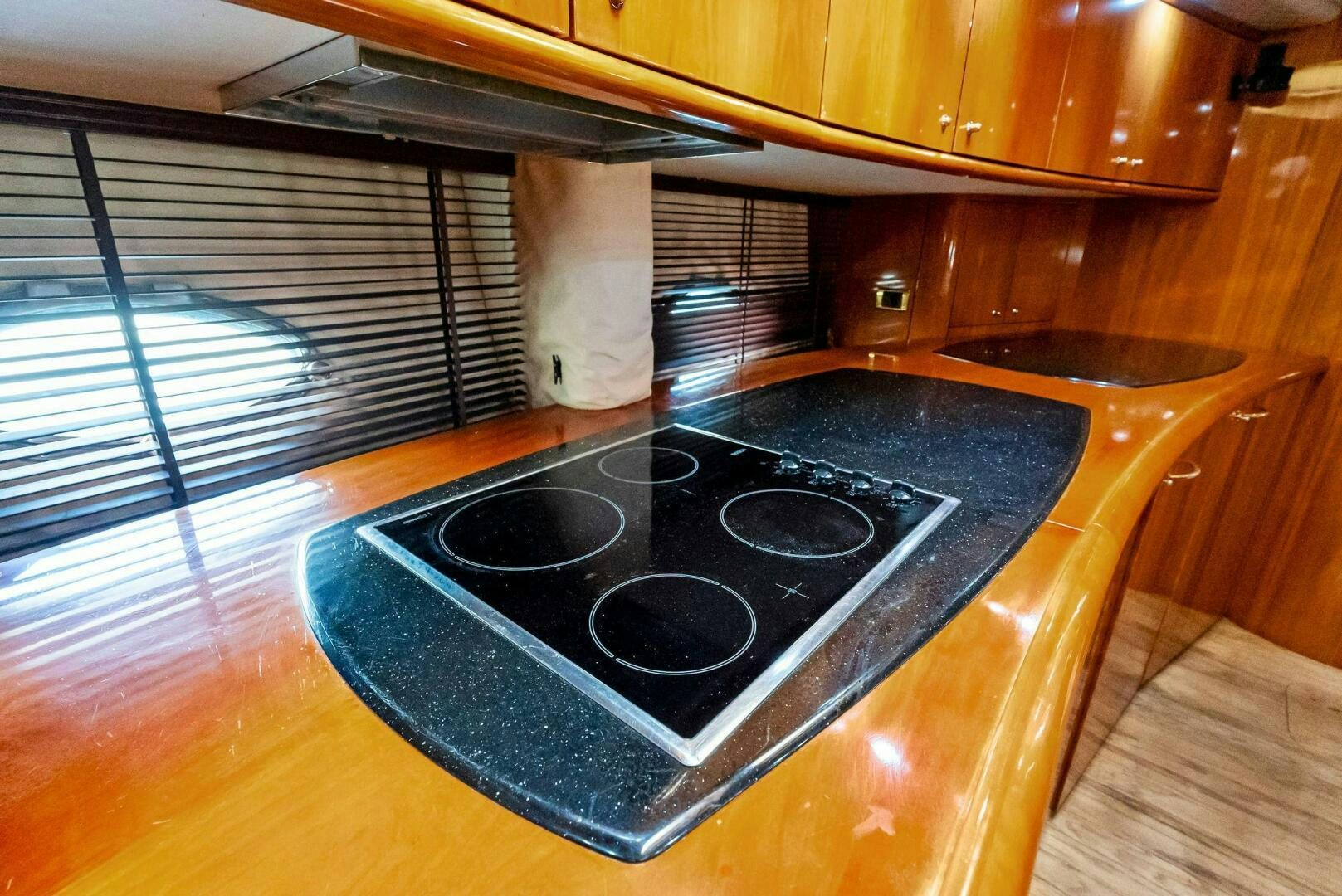 a stove in a kitchen aboard GAMBLER Yacht for Sale