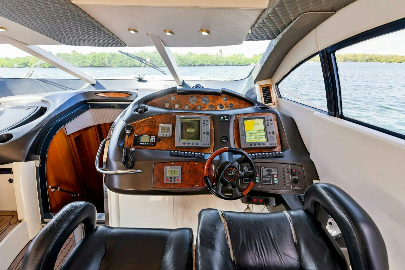the inside of a car aboard GAMBLER Yacht for Sale