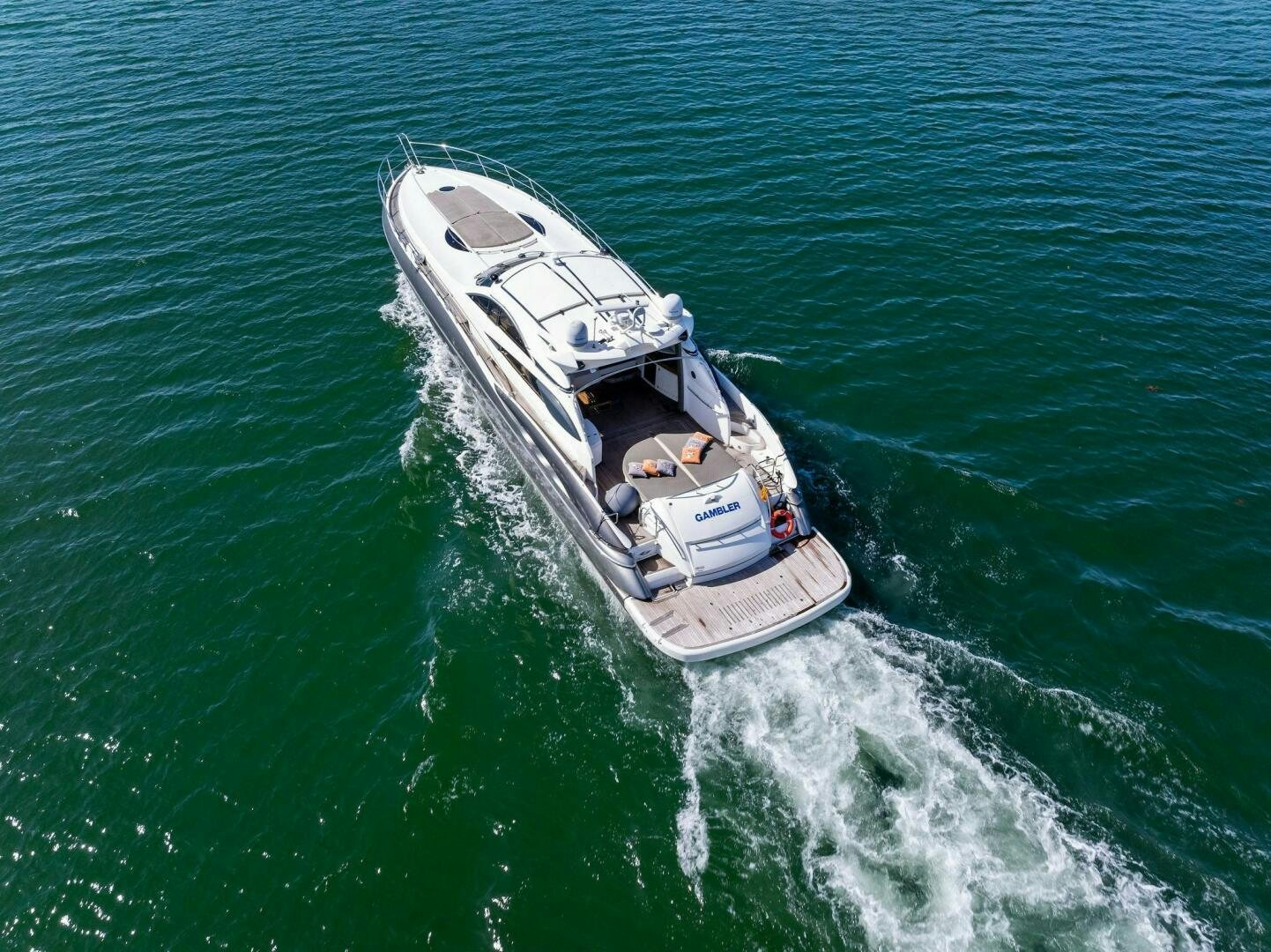 a boat in the water aboard GAMBLER Yacht for Sale