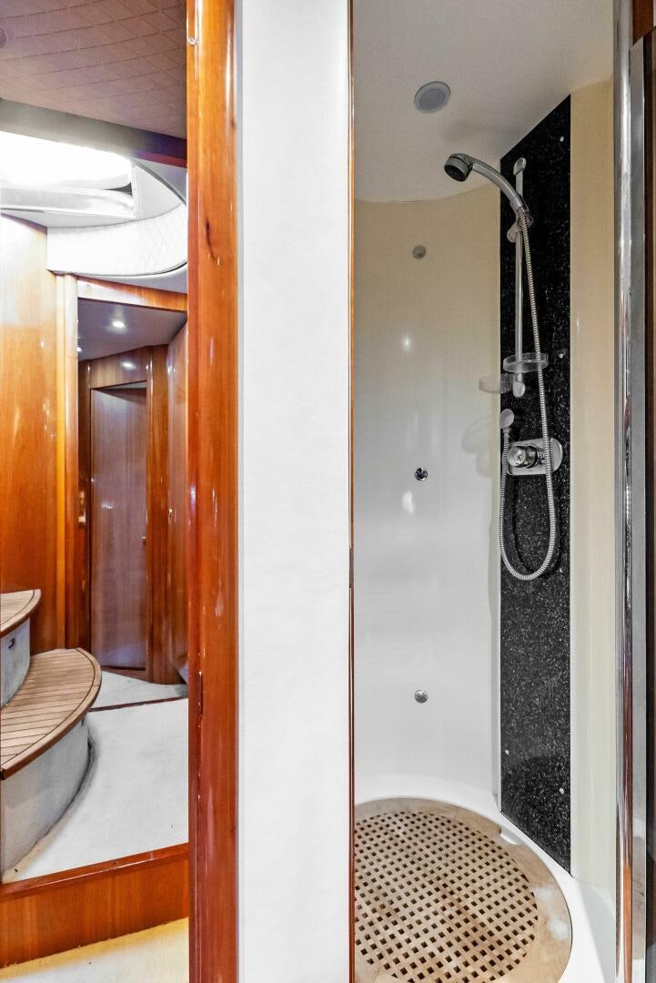 a shower unit in a bathroom aboard GAMBLER Yacht for Sale