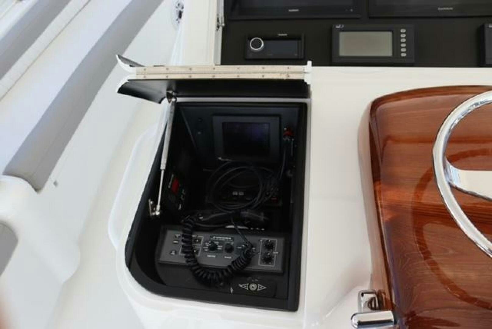 a black and silver car stereo aboard BANDITO Yacht for Sale