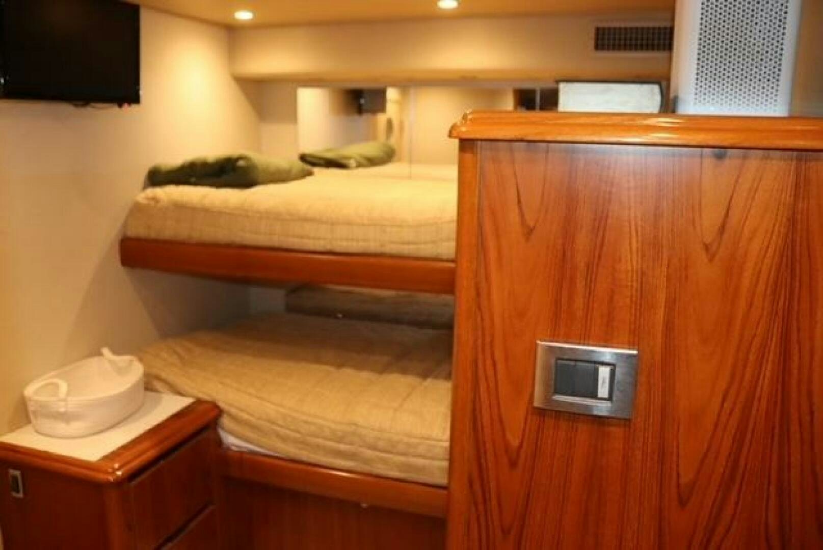 a room with bunk beds aboard BANDITO Yacht for Sale