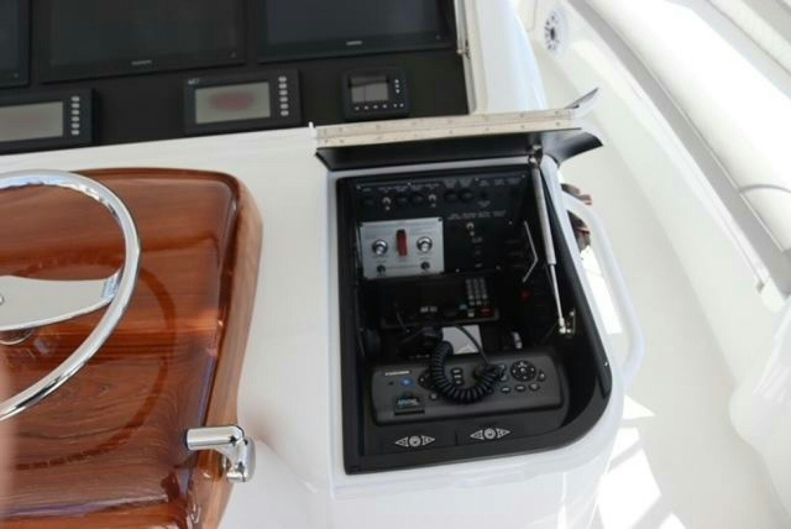 a black rectangular device with a screen aboard BANDITO Yacht for Sale