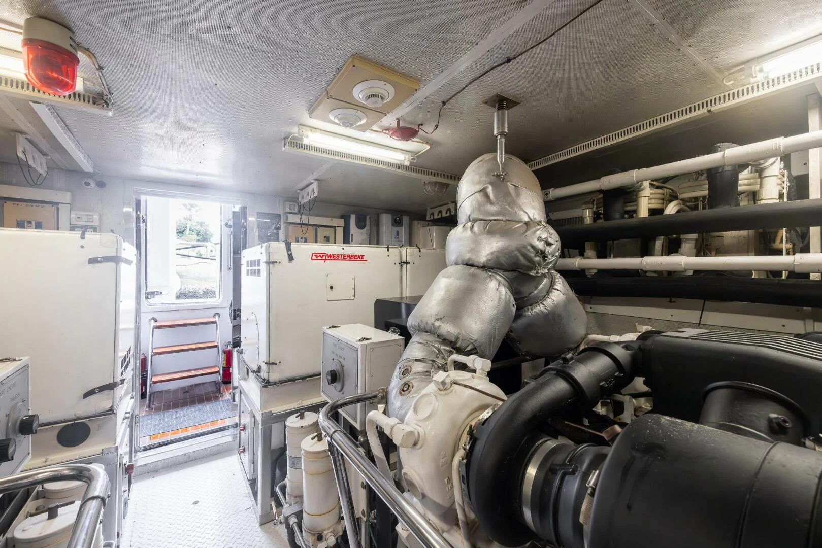 a large metal robot in a factory aboard OCEAN 1 Yacht for Sale