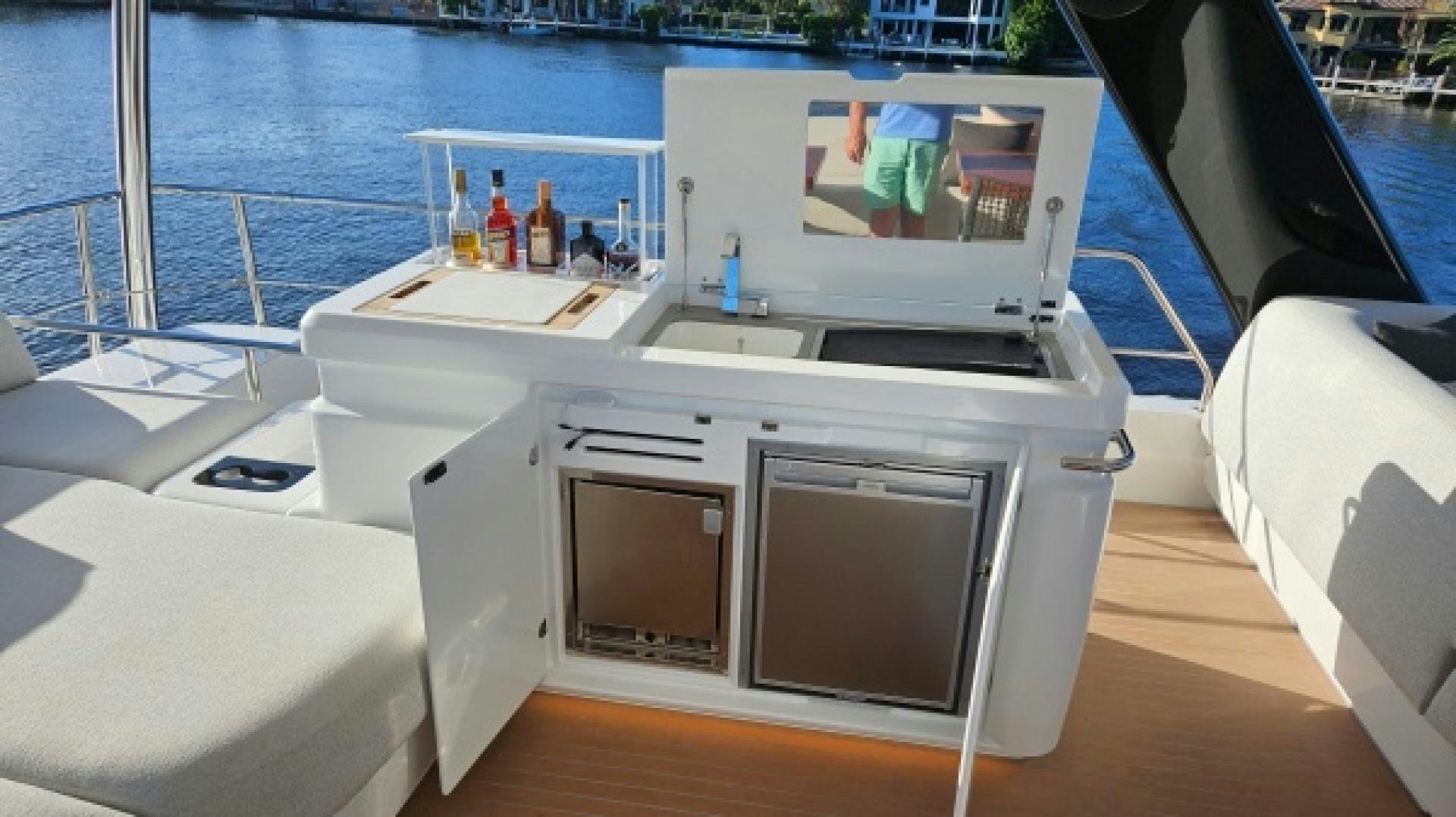 a boat with a couple of computers on it aboard SUNLOVE Yacht for Sale