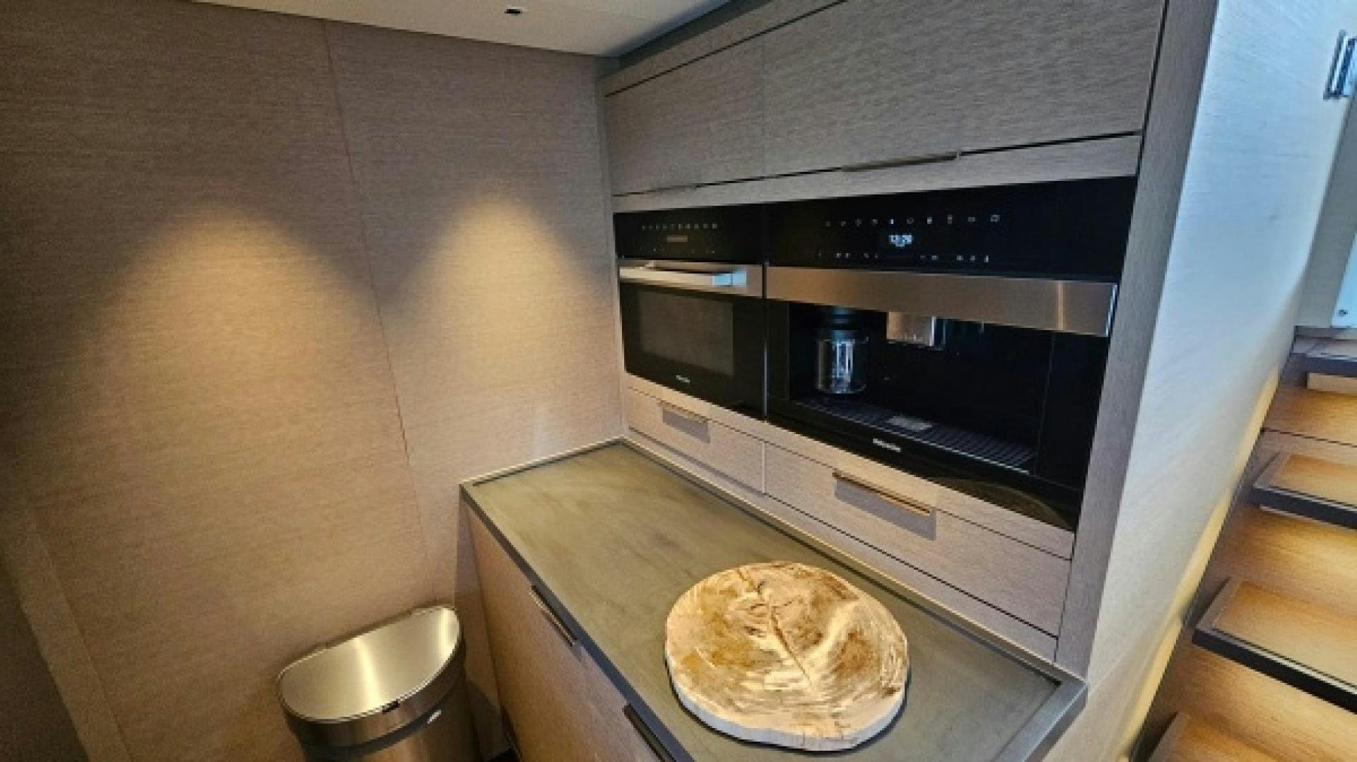a kitchen with a microwave oven aboard SUNLOVE Yacht for Sale