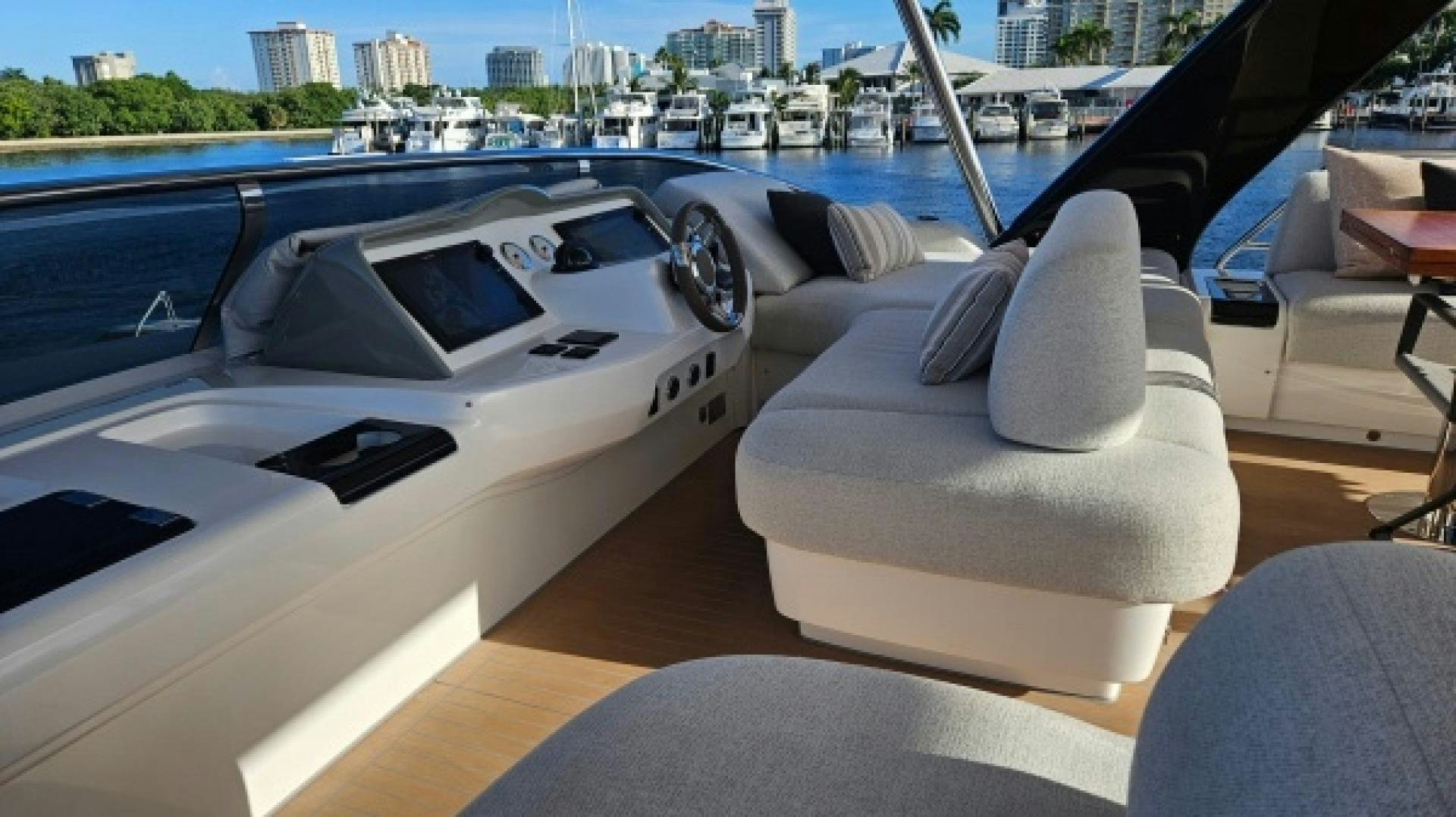 a white car with a convertible top aboard SUNLOVE Yacht for Sale