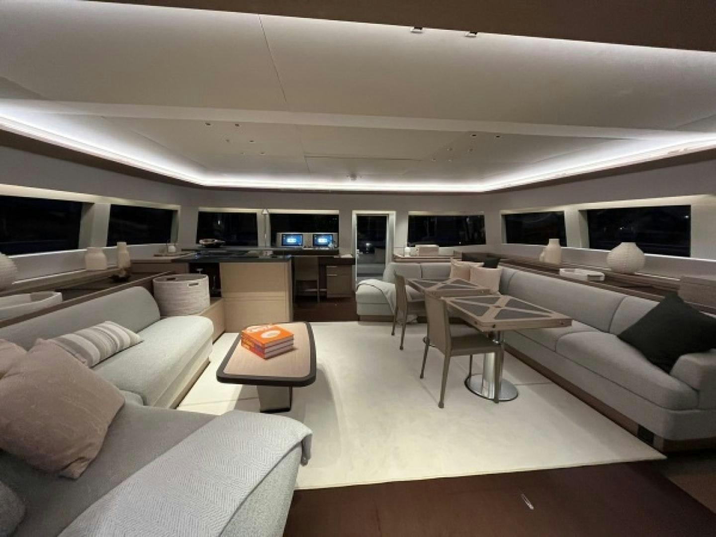 a living room with a couch and a table aboard SUNLOVE Yacht for Sale