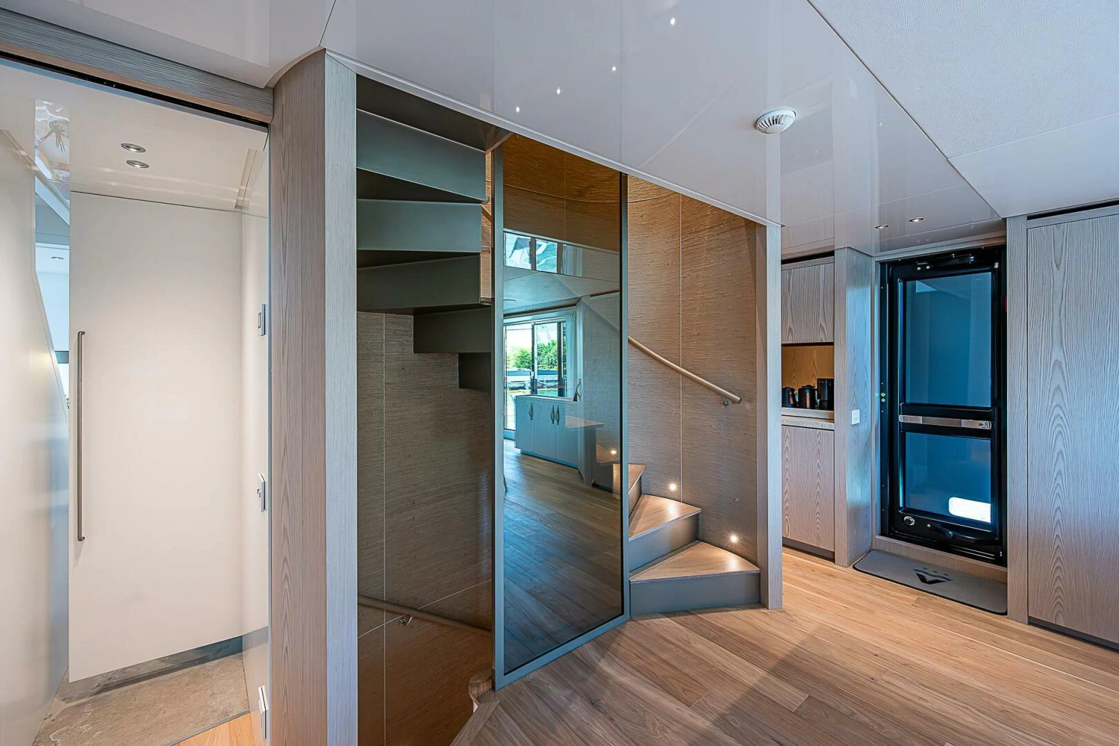 a room with a large glass door aboard F 118 Yacht for Sale