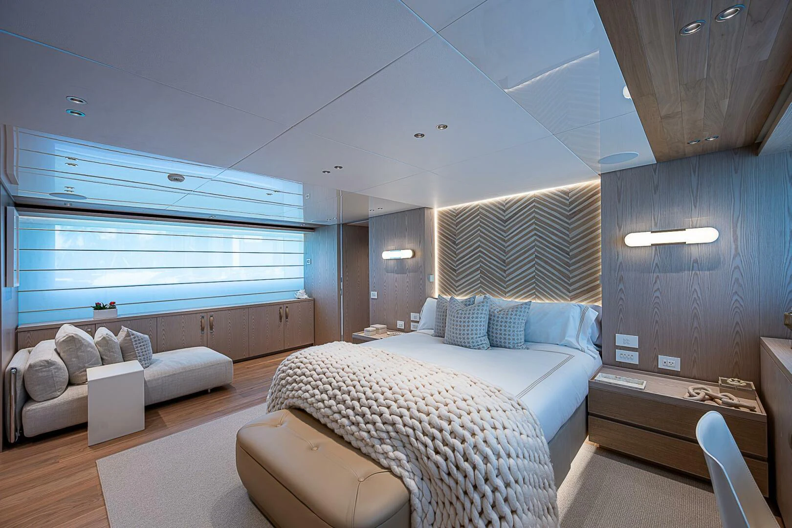 a room with a bed and a window aboard F 118 Yacht for Sale