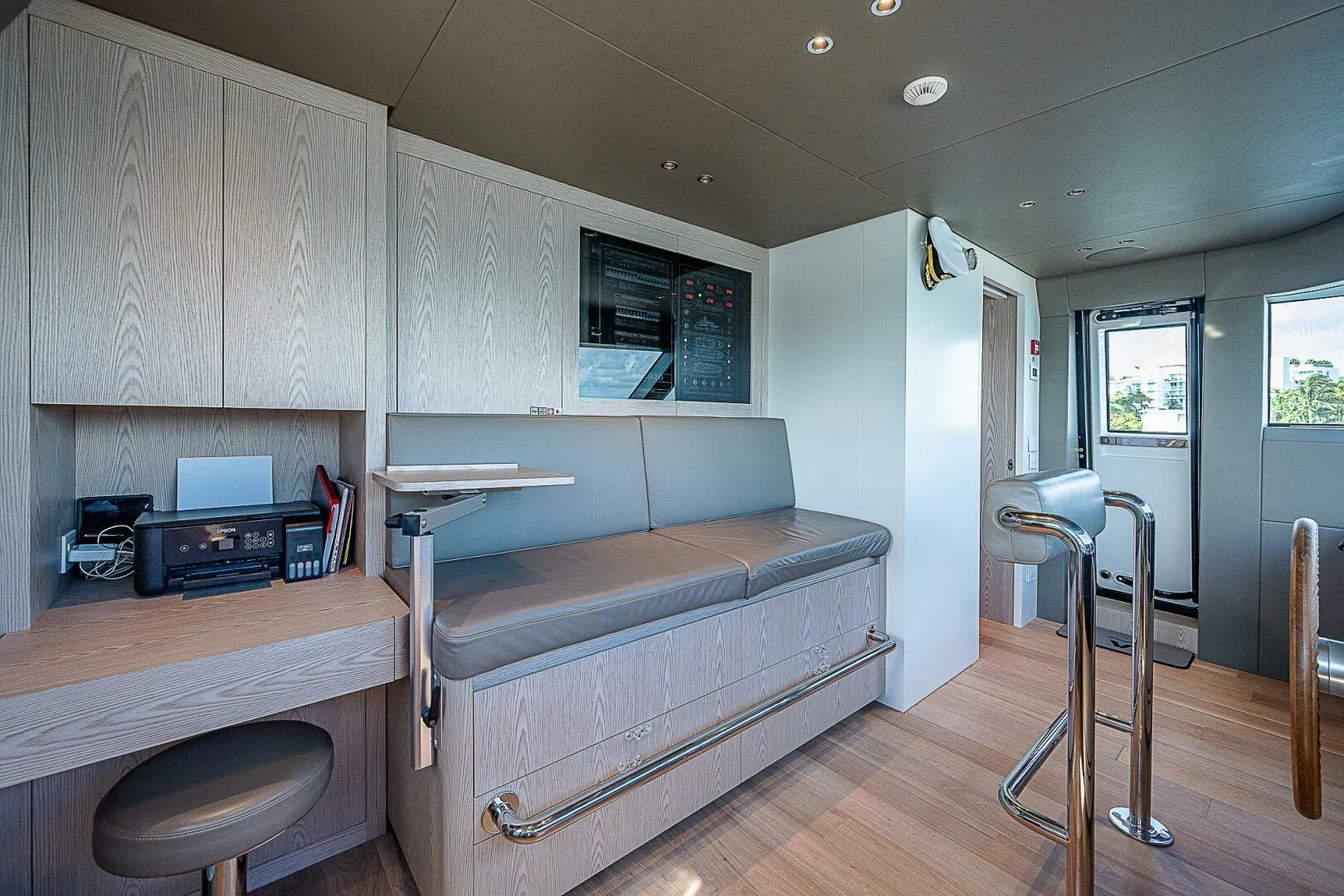 a living room with a couch and a table aboard F 118 Yacht for Sale