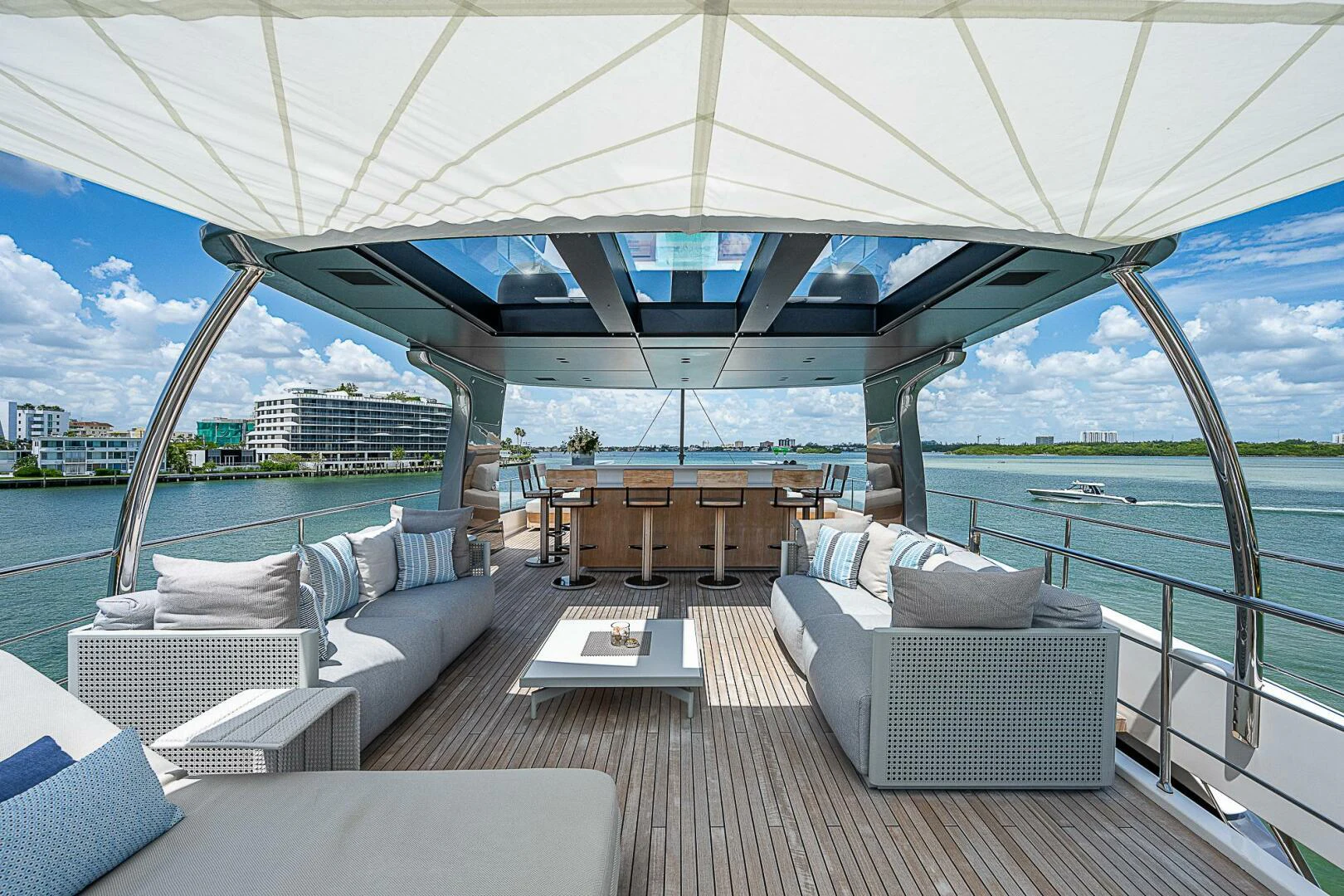 a large lounge area with a large patio and a large pool aboard F 118 Yacht for Sale