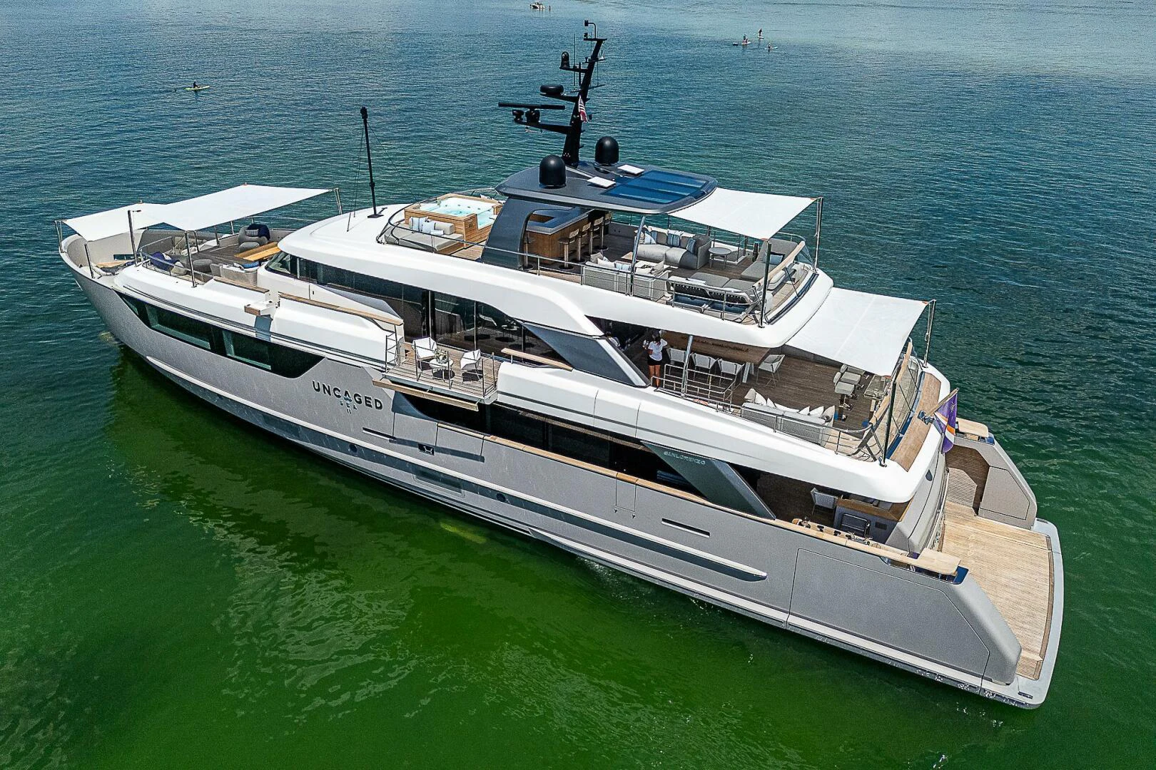 a white boat in the water aboard F 118 Yacht for Sale