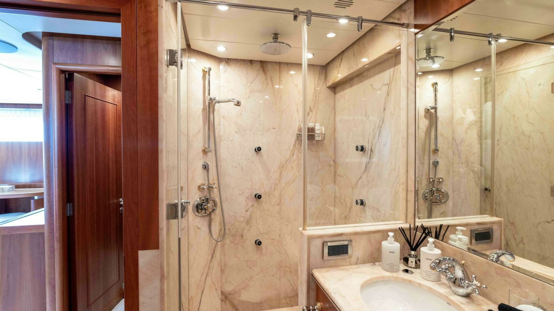 a bathroom with a shower unit and sink aboard STAY SALTY Yacht for Sale
