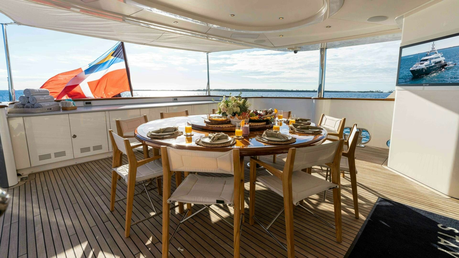 a dining table in a room aboard STAY SALTY Yacht for Sale