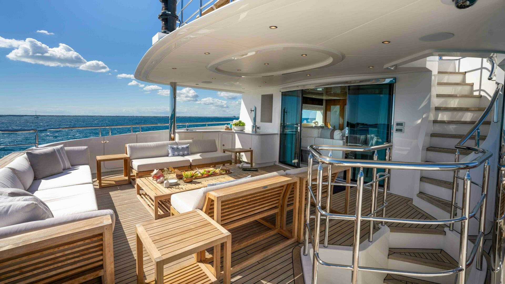 a room with a table and chairs aboard STAY SALTY Yacht for Sale