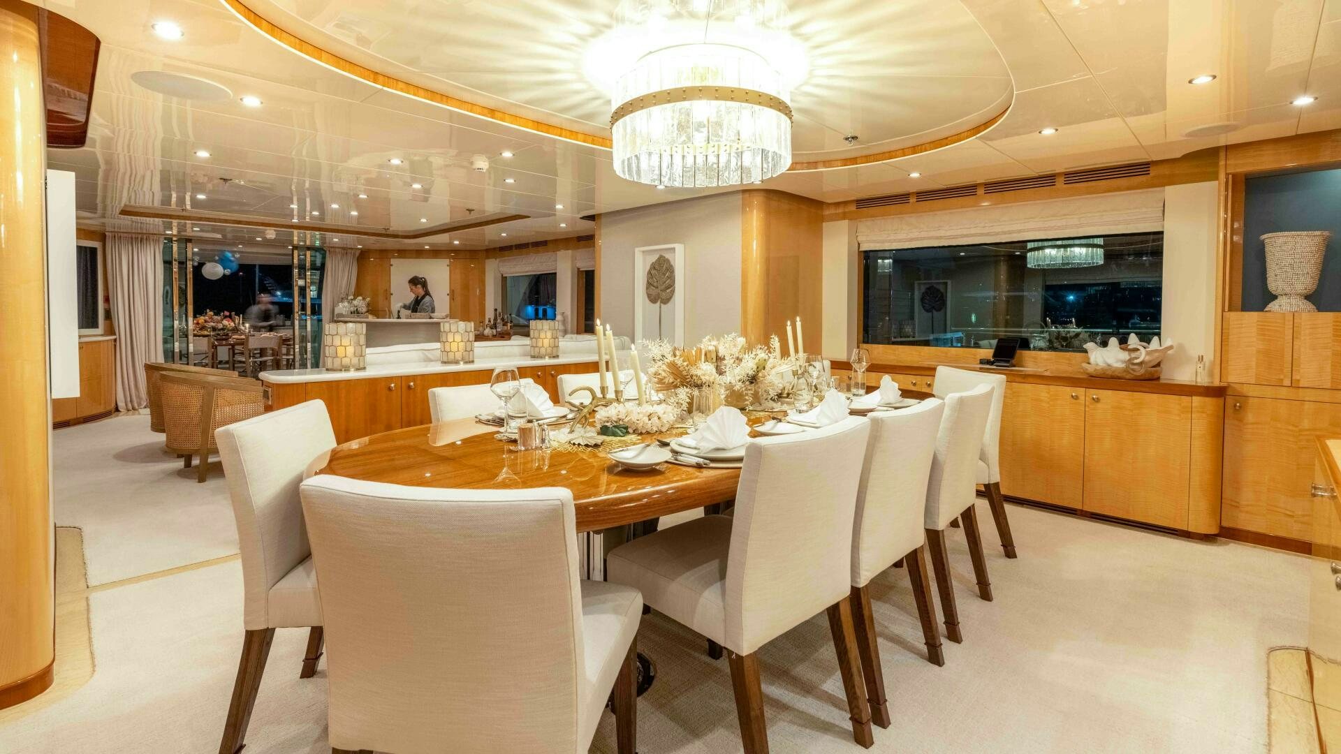 a large dining room with a large table and chairs aboard STAY SALTY Yacht for Sale