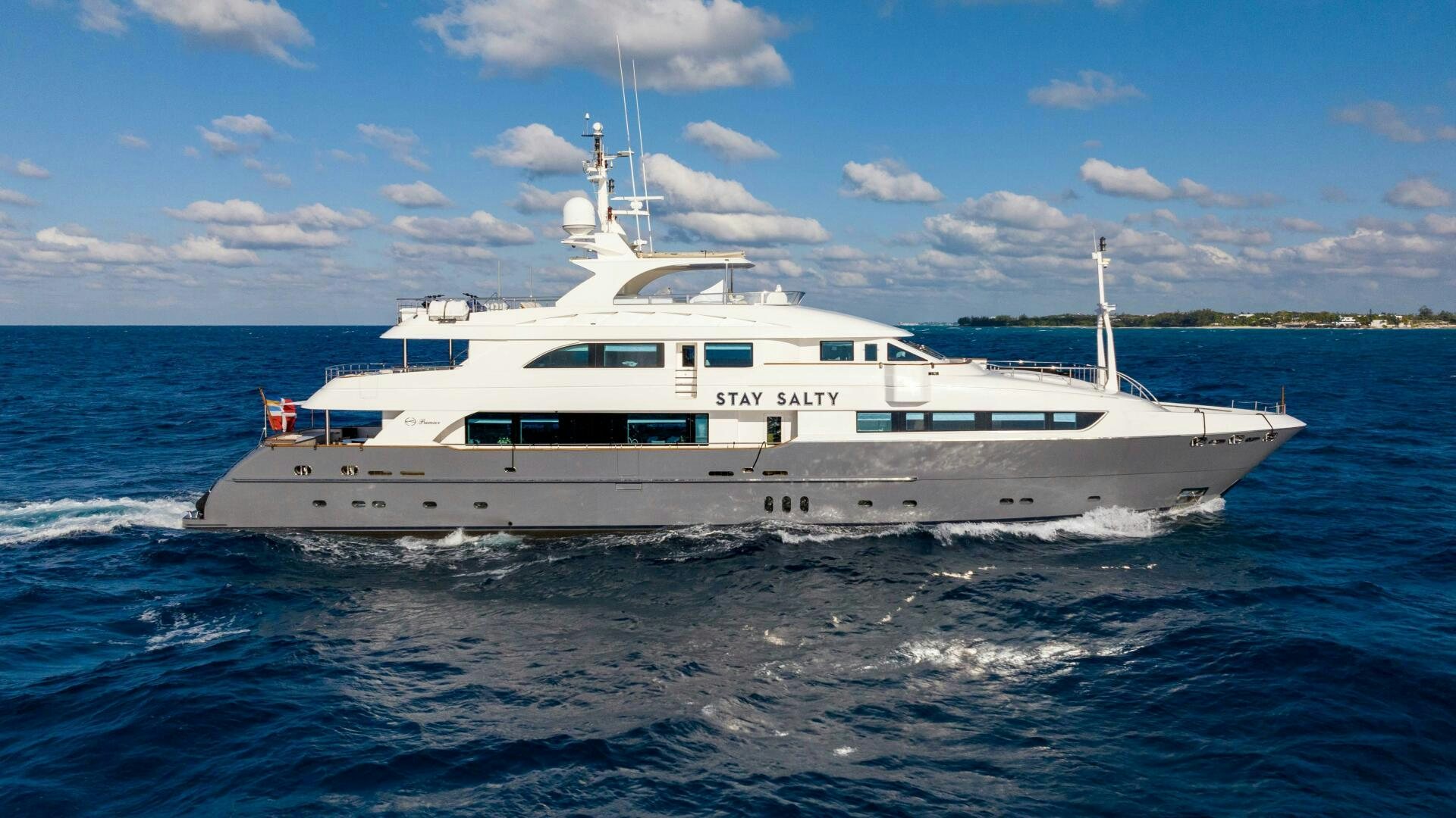 a white boat in the water aboard STAY SALTY Yacht for Sale