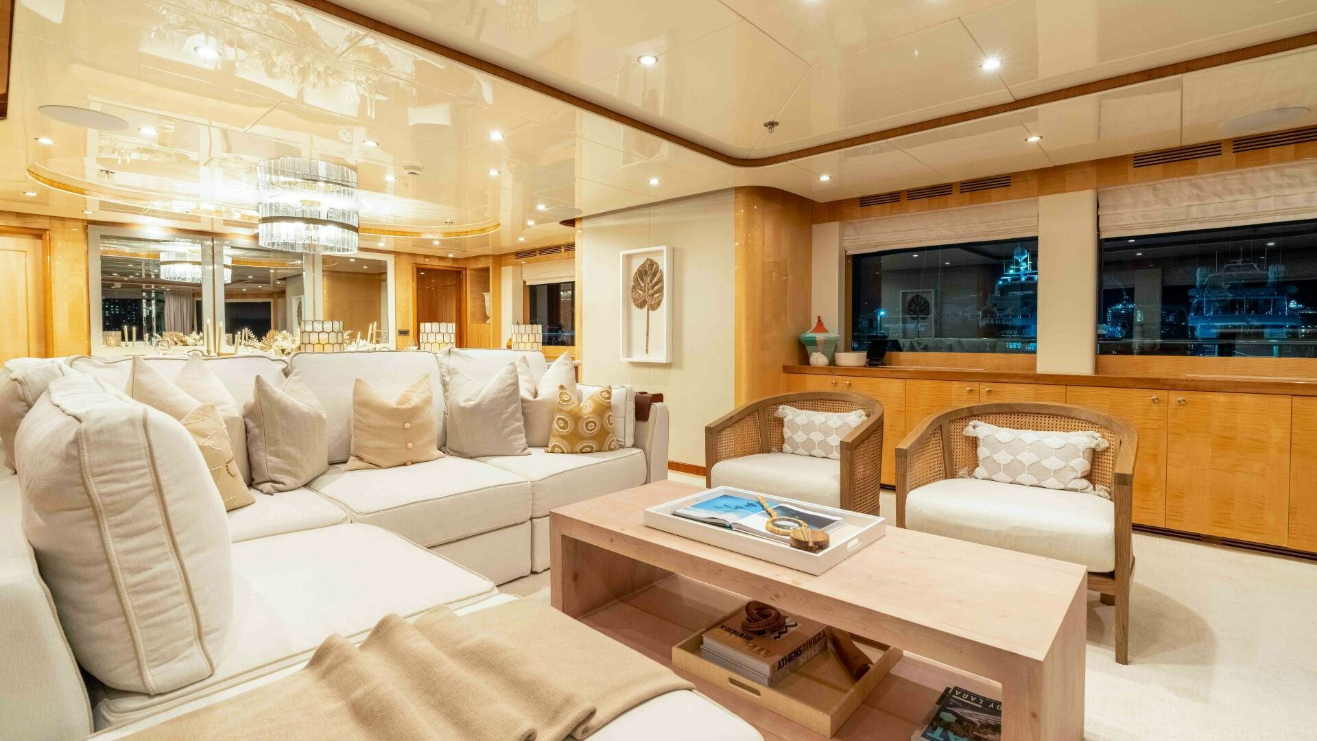 a living room with a large window aboard STAY SALTY Yacht for Sale