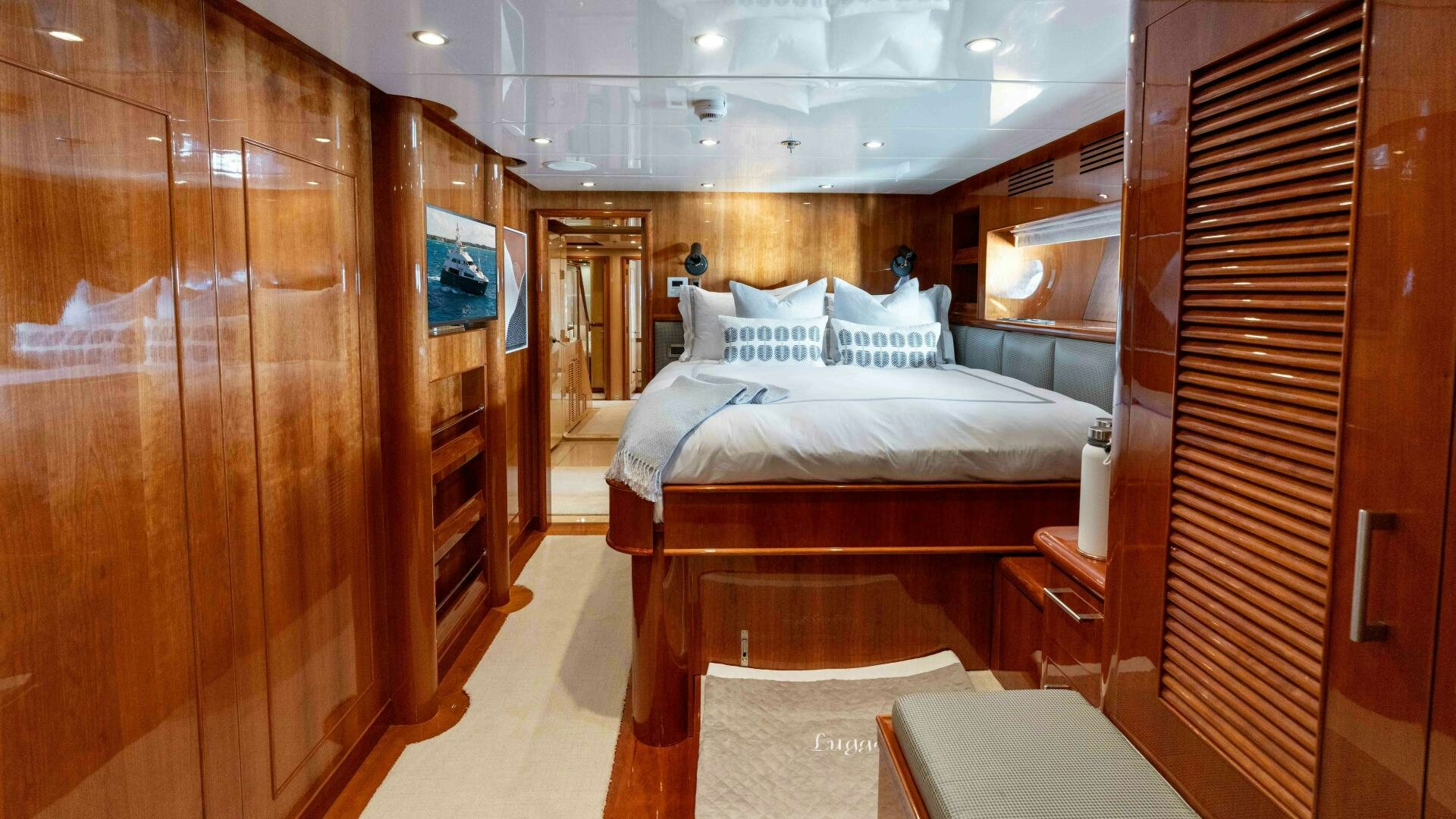 a room with a bed and a desk aboard STAY SALTY Yacht for Sale