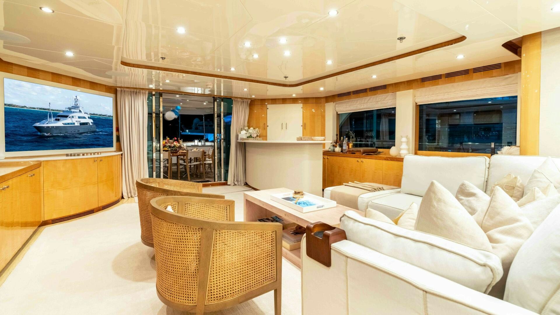 a room with a couch and a table aboard STAY SALTY Yacht for Sale