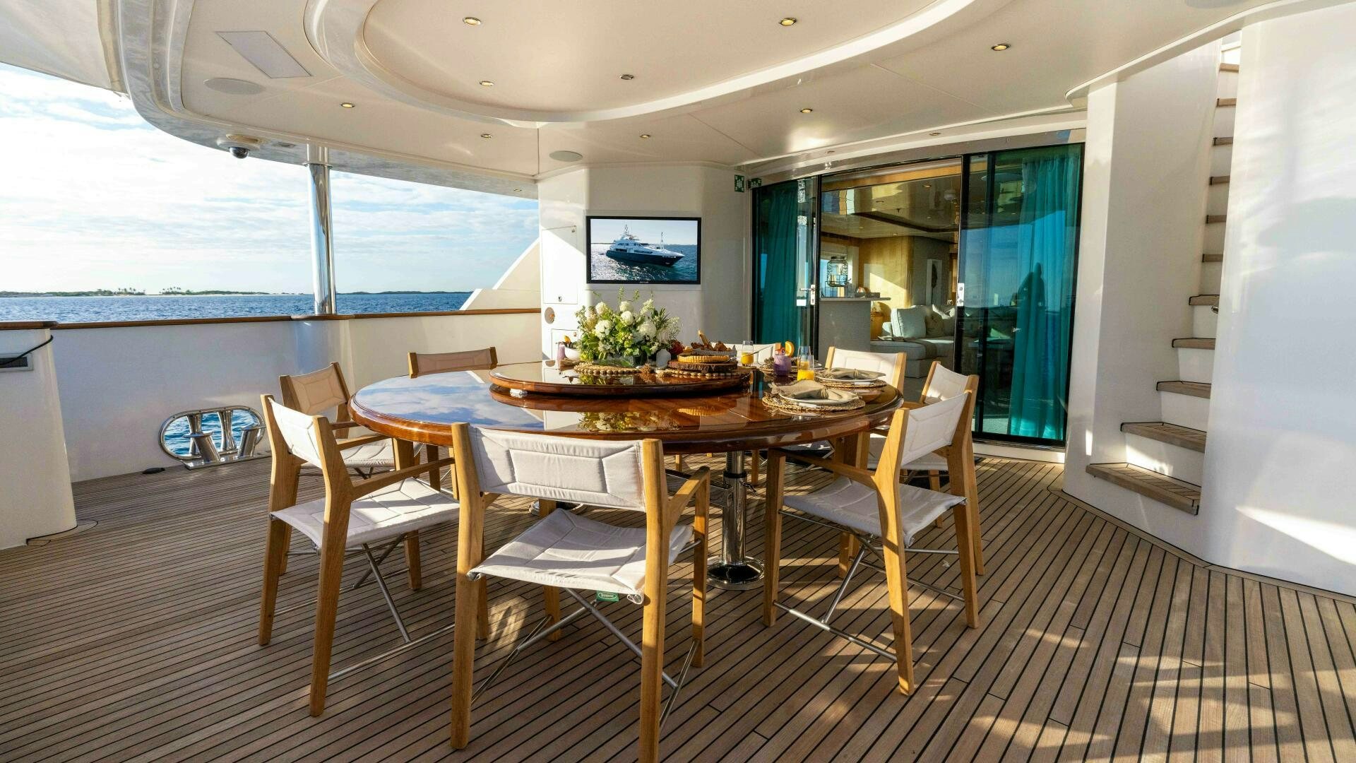 a table and chairs in a room aboard STAY SALTY Yacht for Sale