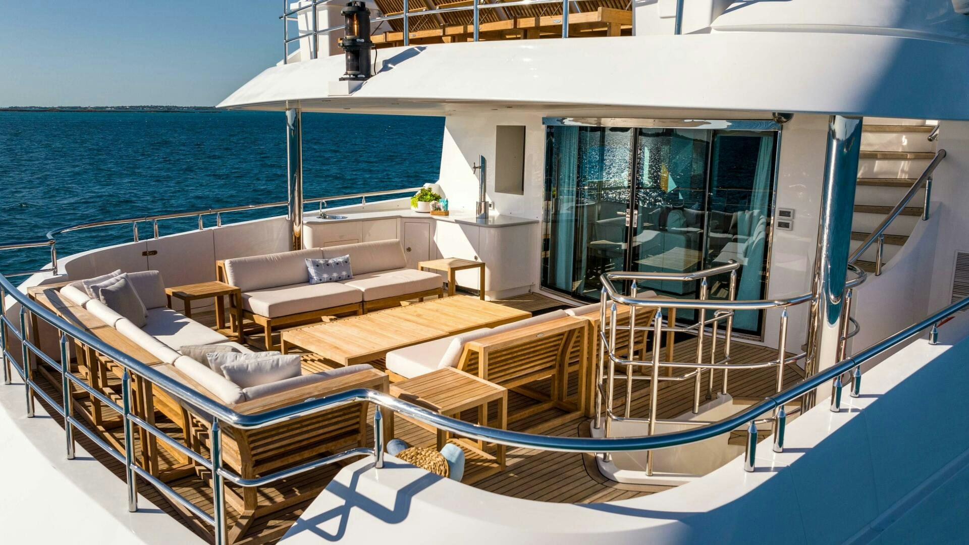 a balcony with a view of the ocean aboard STAY SALTY Yacht for Sale