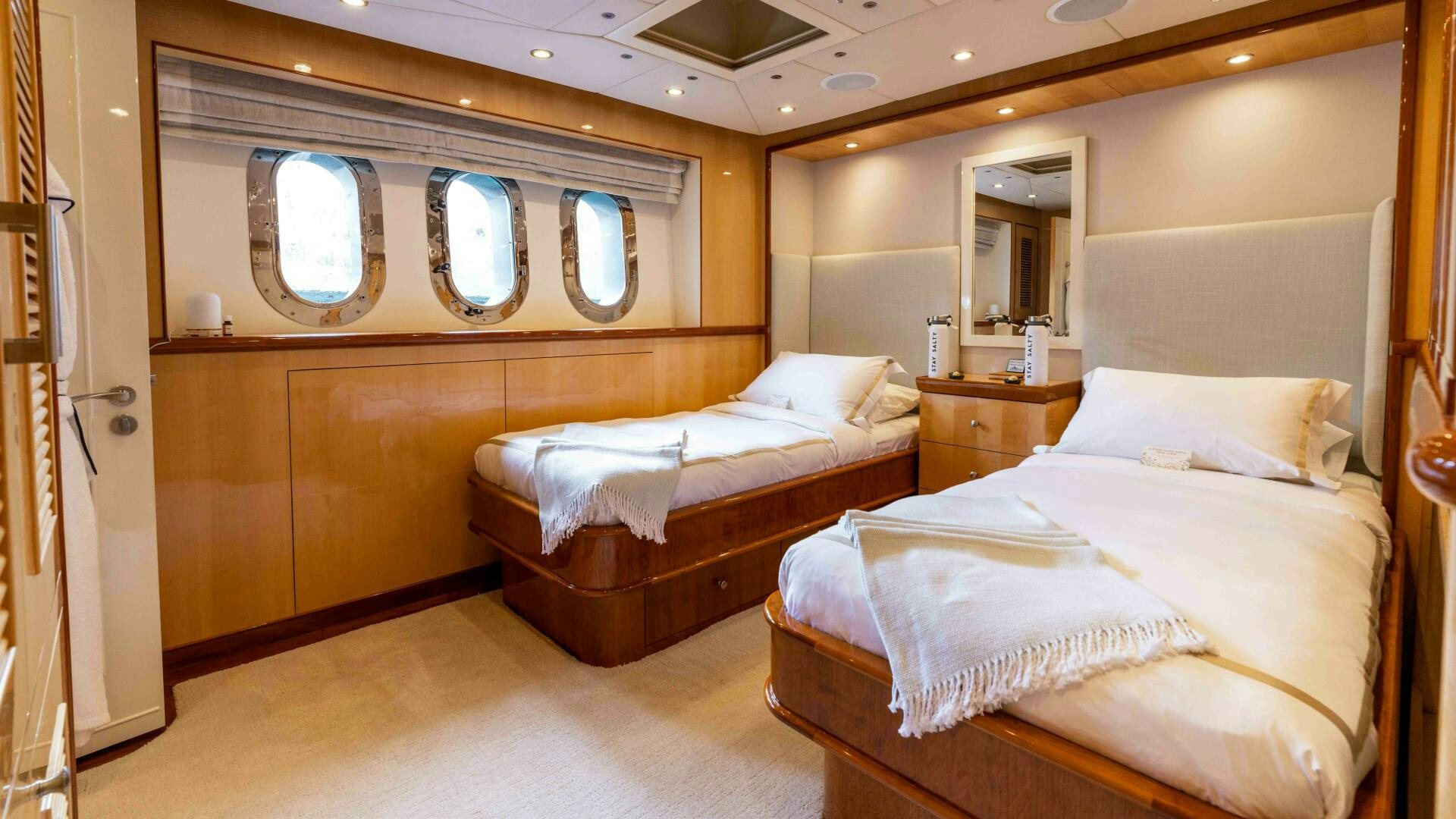 a room with two beds aboard STAY SALTY Yacht for Sale