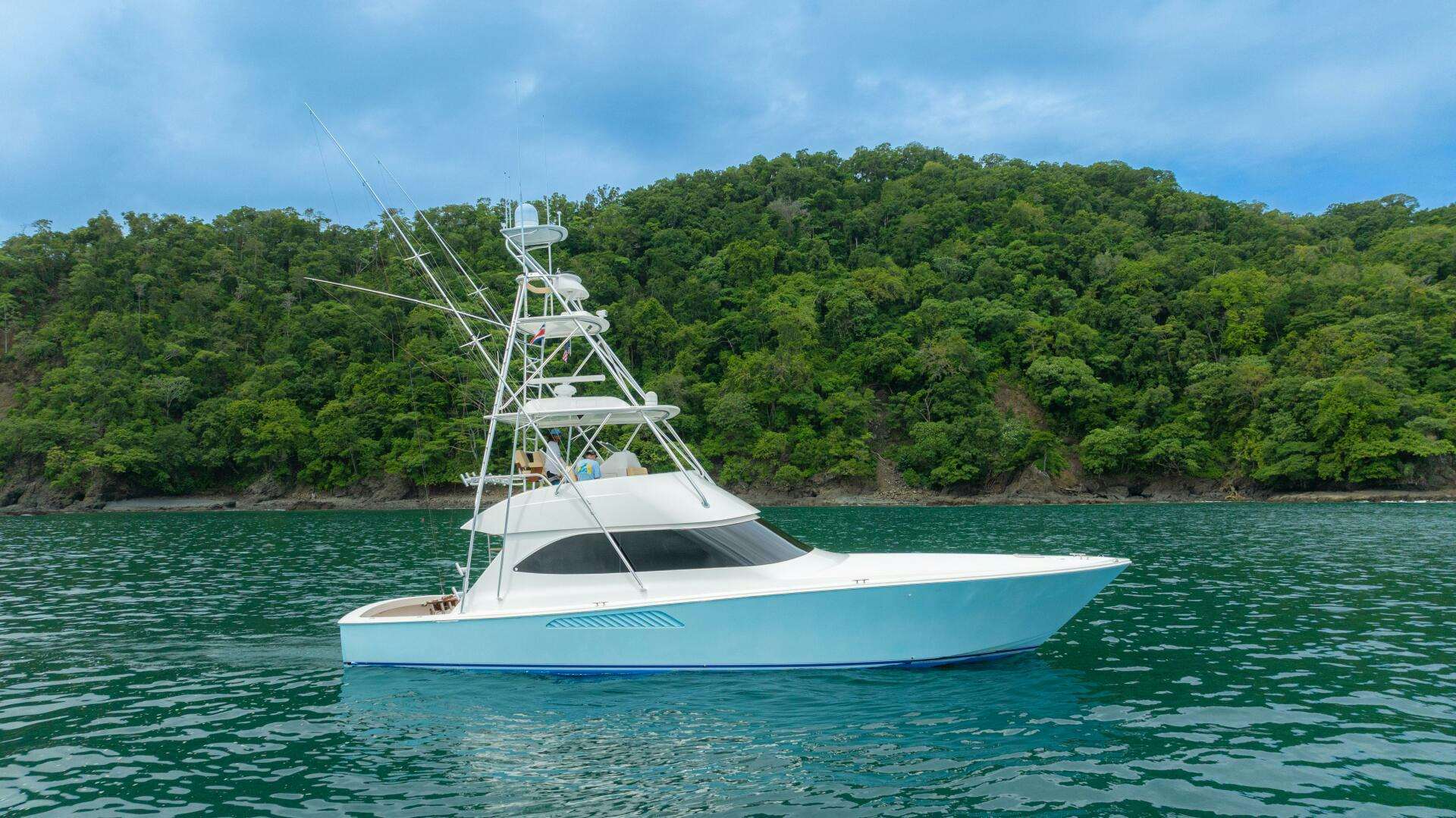 a white boat in the water aboard MANUDITO Yacht for Sale