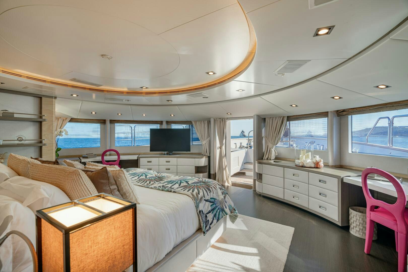 a bedroom with a bed and a tv aboard JUSTA DELIA Yacht for Sale