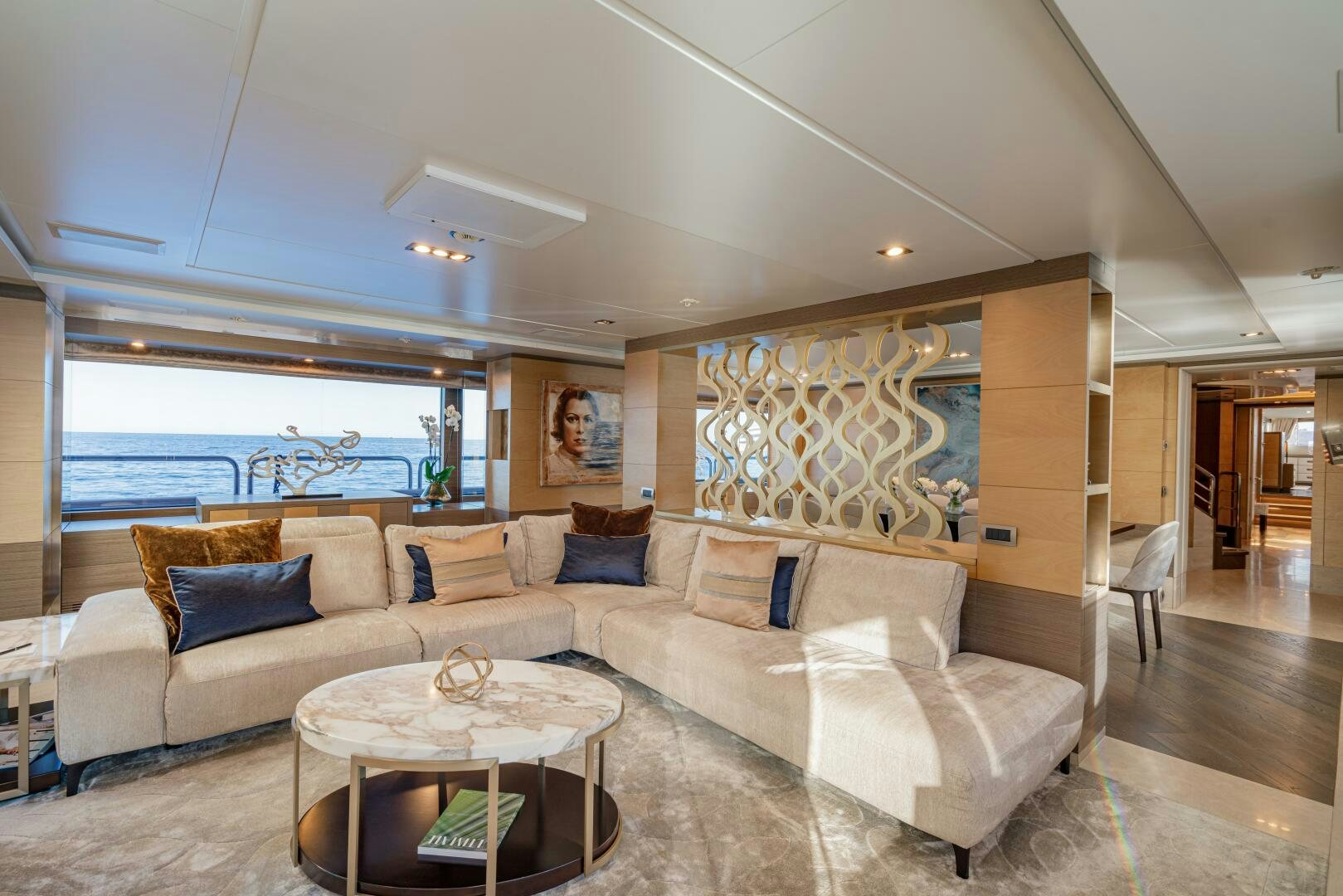 a living room with a large window aboard JUSTA DELIA Yacht for Sale