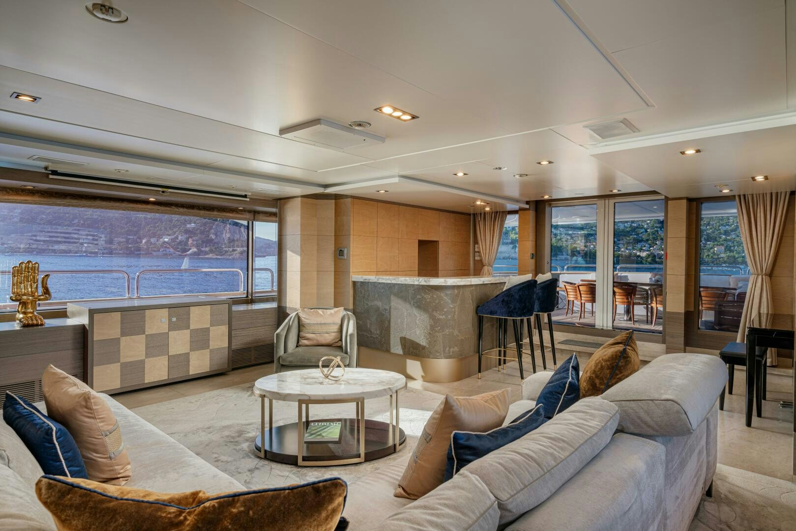 a living room with a fireplace aboard JUSTA DELIA Yacht for Sale