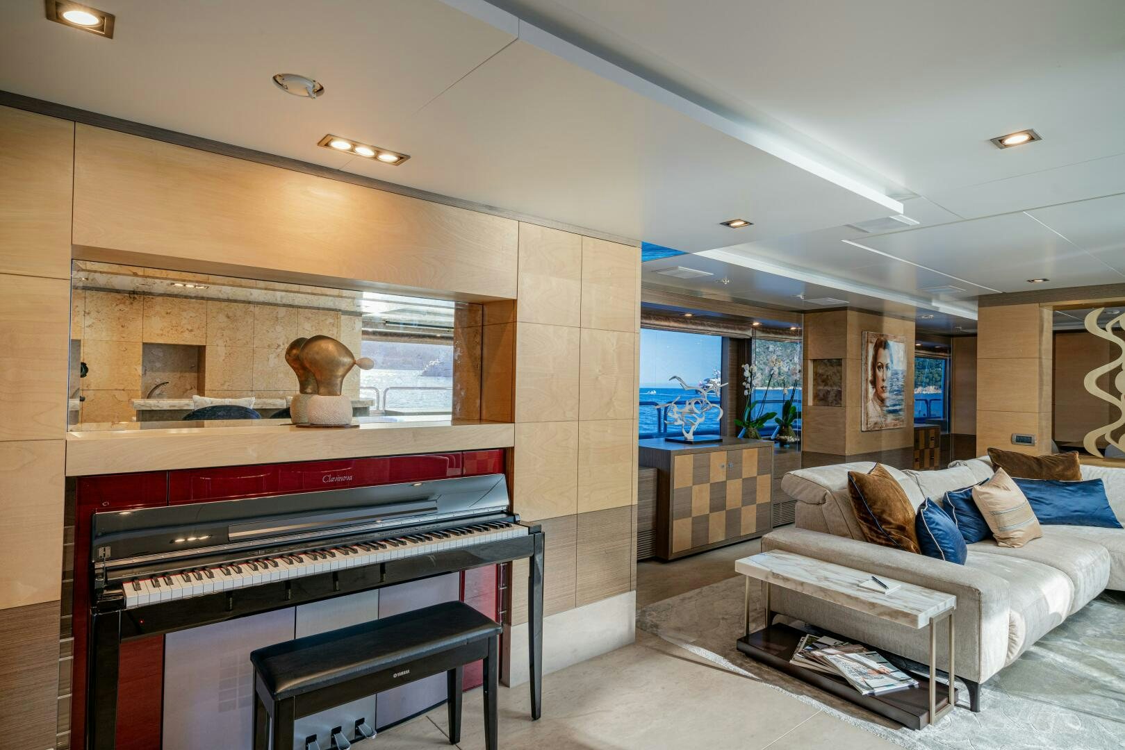 a living room with a couch and a table aboard JUSTA DELIA Yacht for Sale